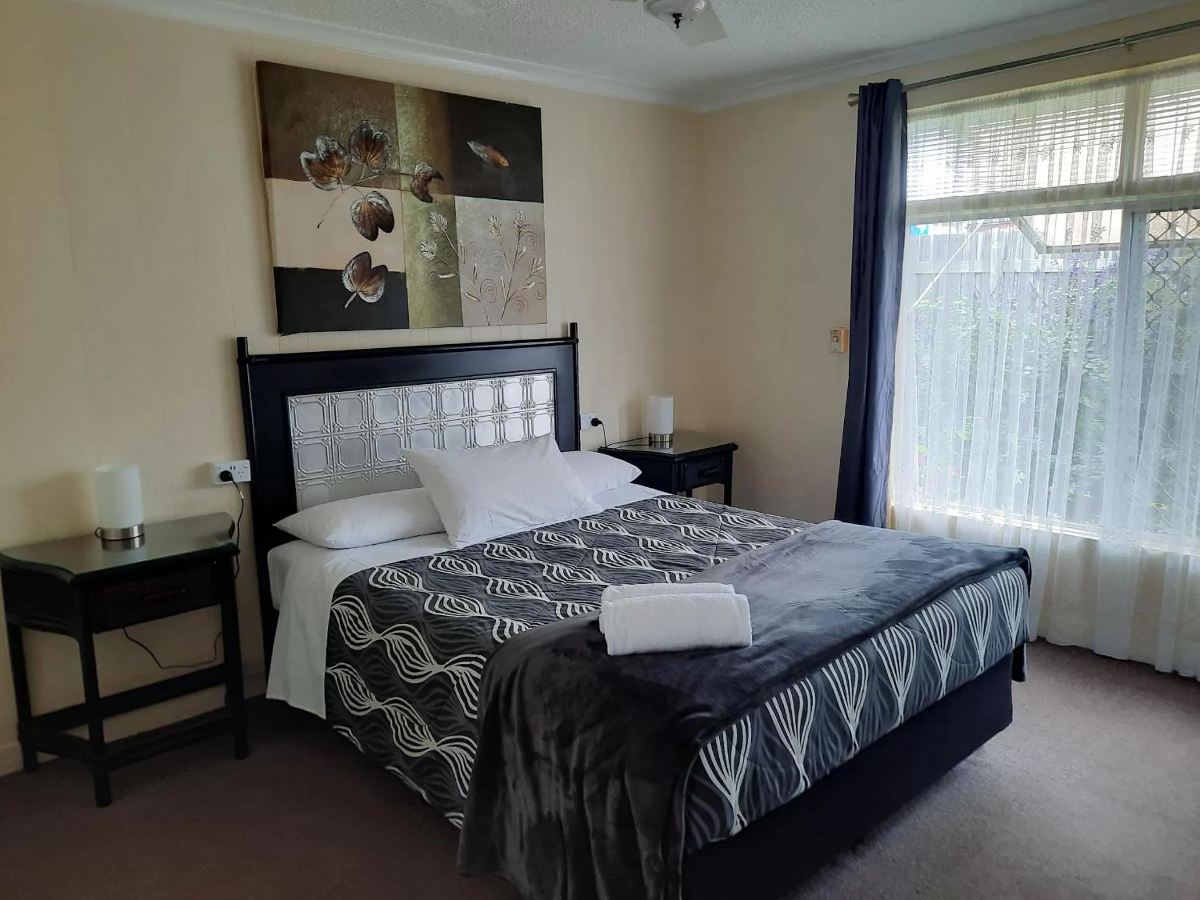 Bed in Flying Spur Motel