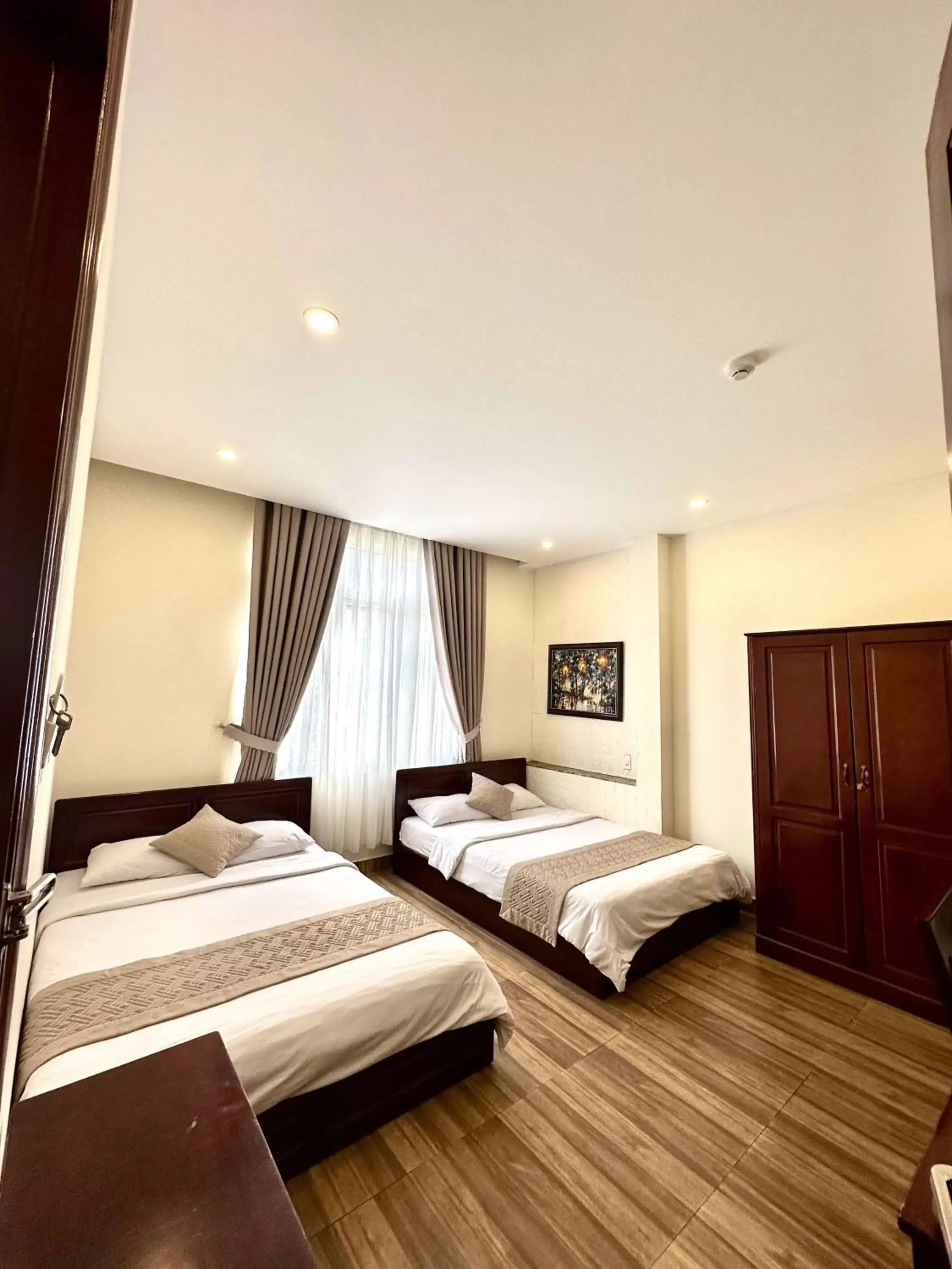 Bed in Nam Xuan Premium Hotel