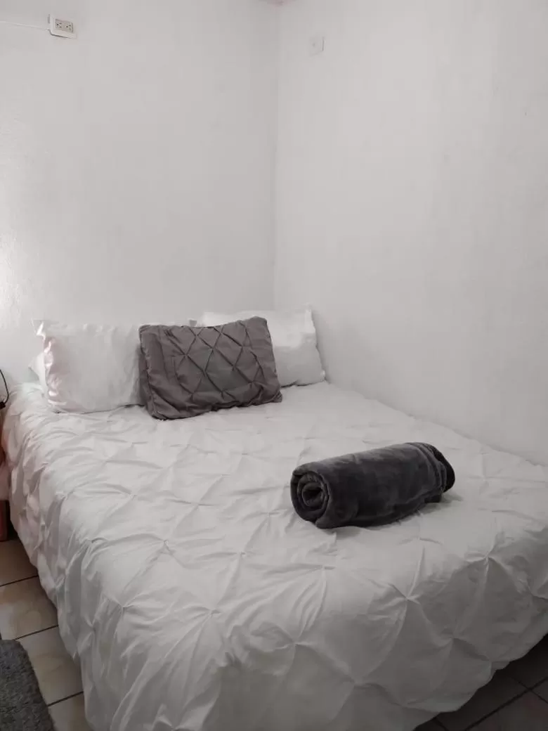 Bed in Hotel Bluehouse