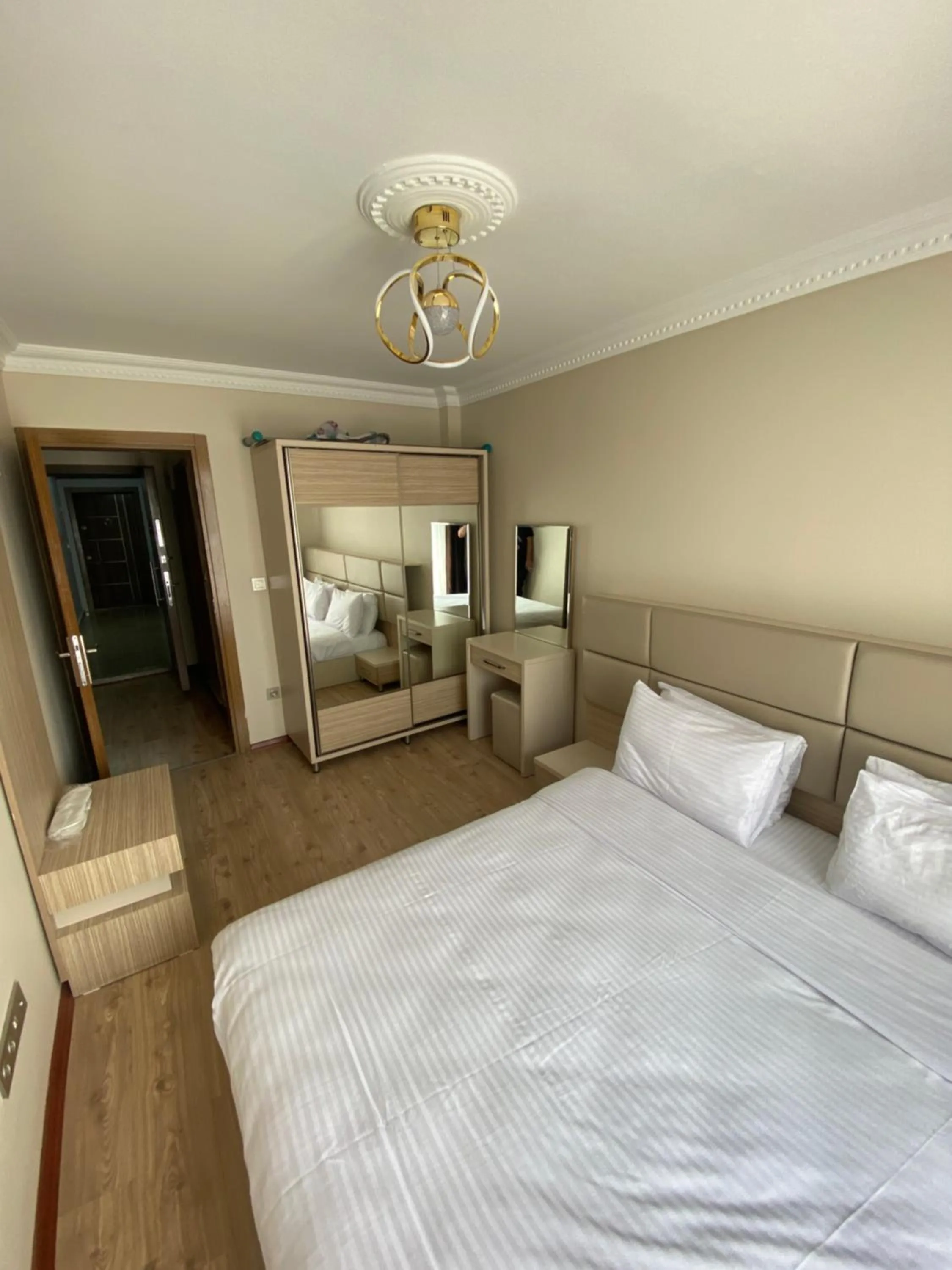 Bed in Overland Residence