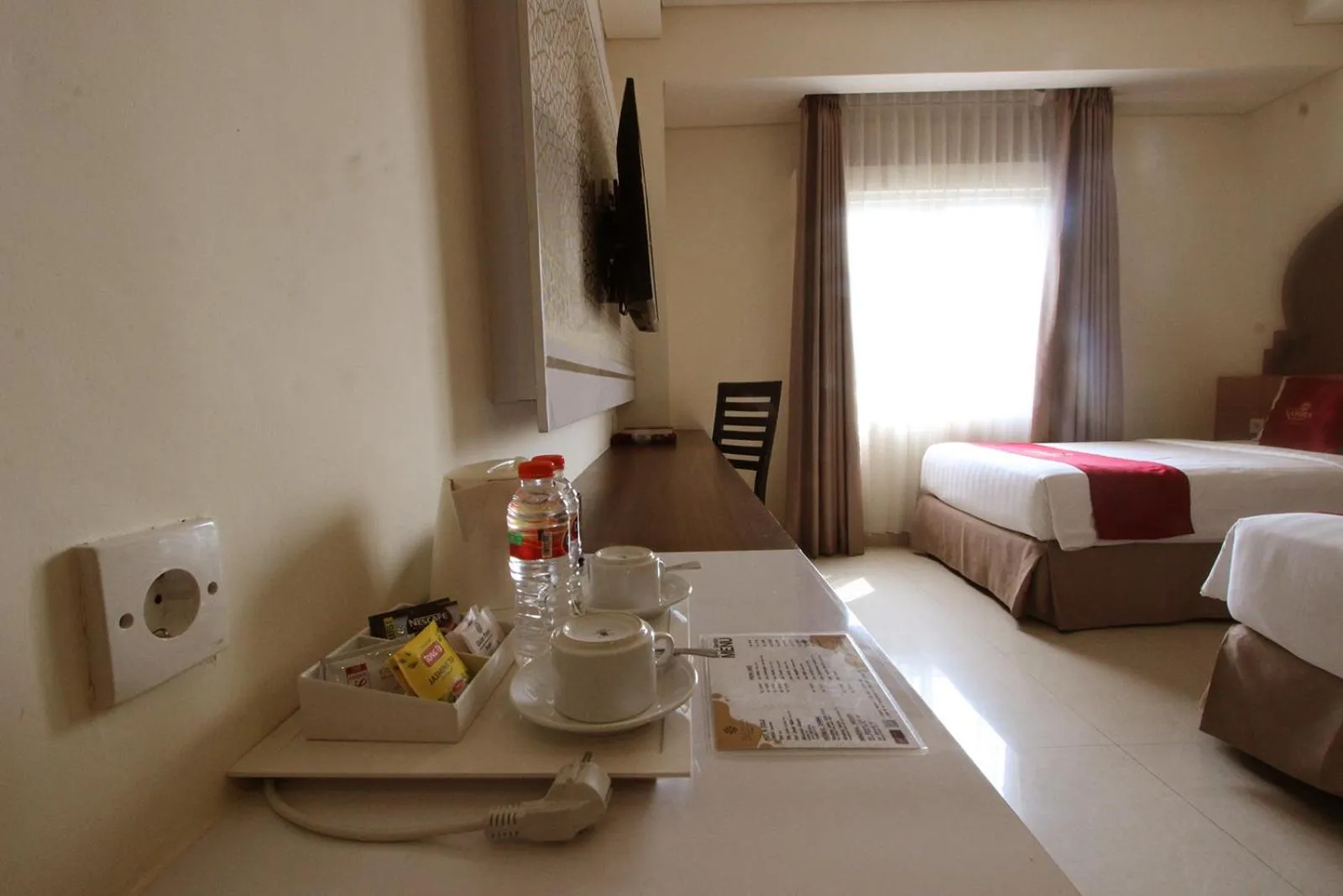 Coffee/tea facilities, Bed in Namira Syariah Hotel Surabaya