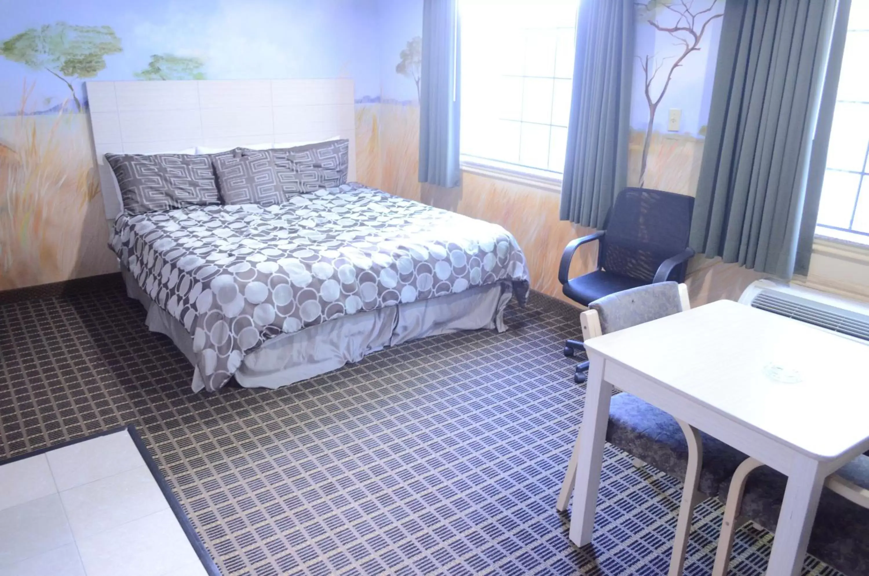 Bedroom, Bed in Scottish Inn and Suites NRG Park/Texas Medical Center - Houston