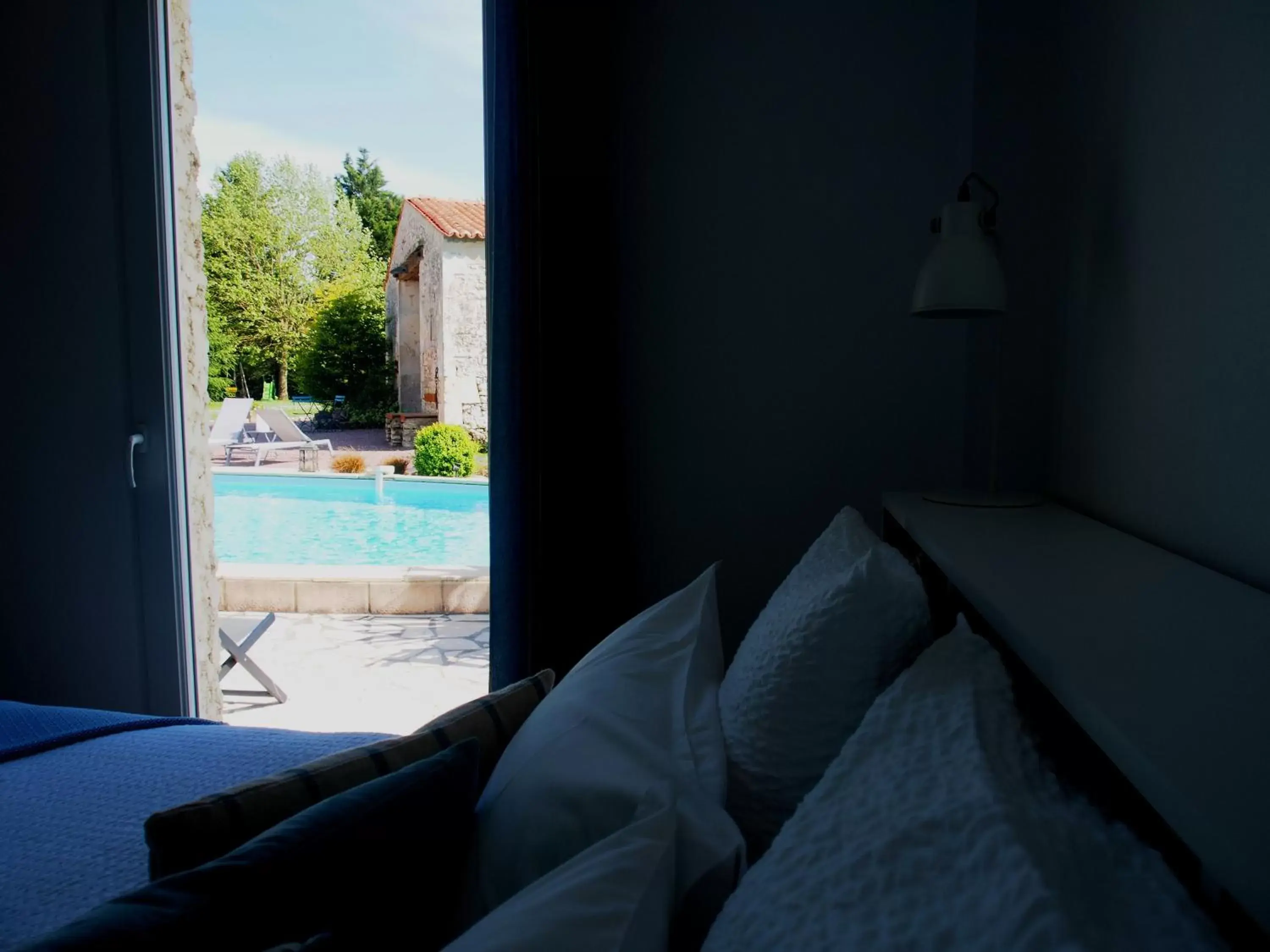 Pool view, Bed in La Charentine