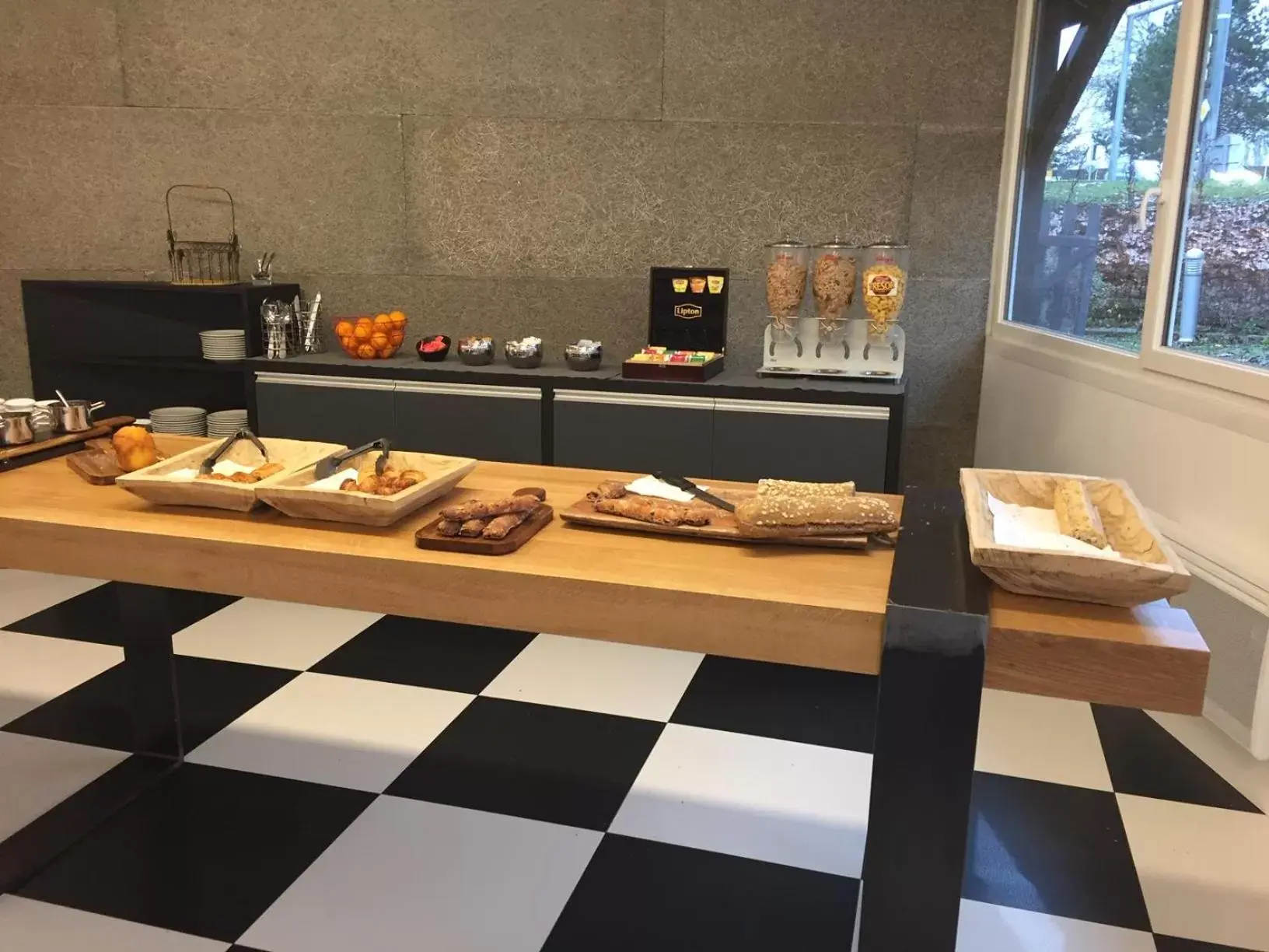 Breakfast in Enzo Hotels Trappes by Kyriad Direct