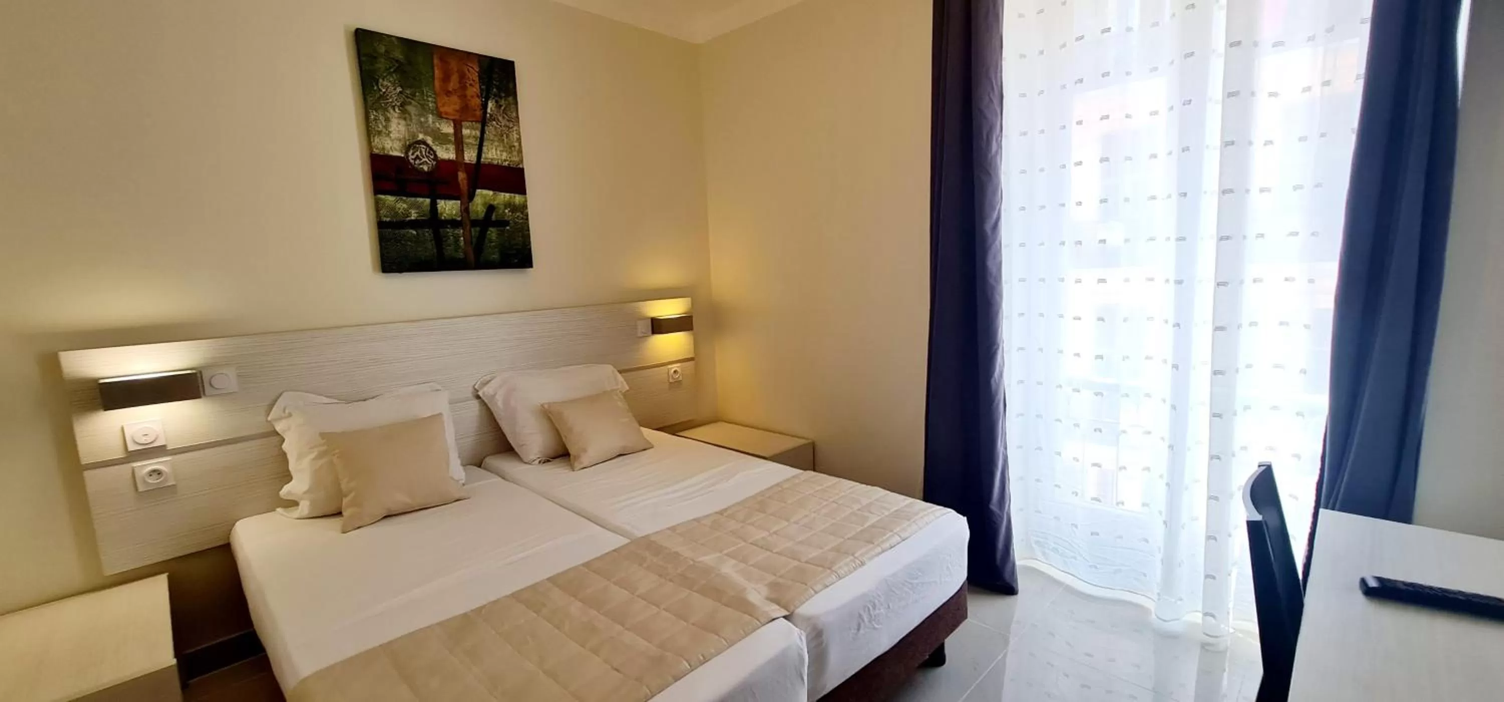 Bed in ESPERANCE HOTEL