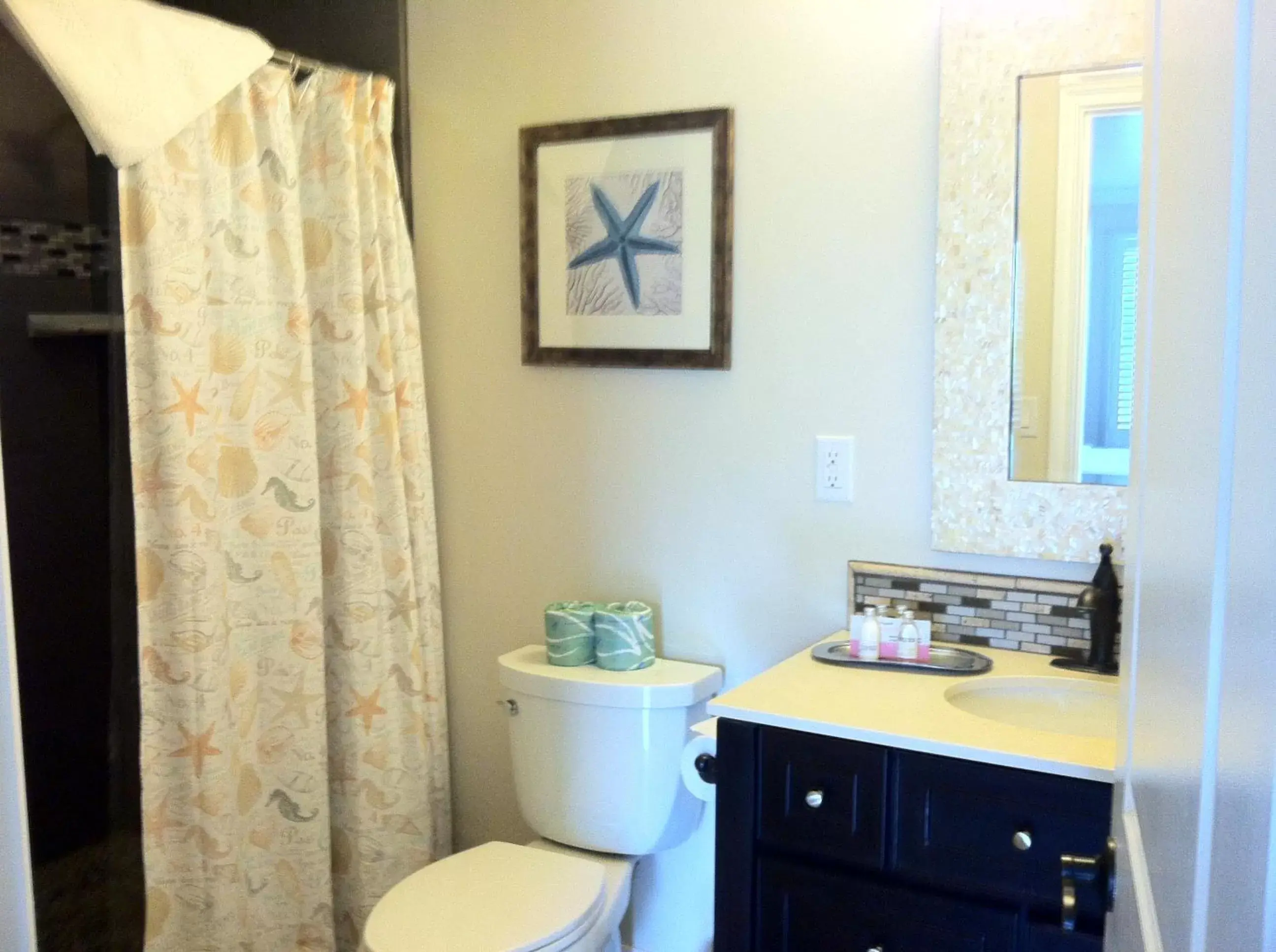 Bathroom in Beach Bungalow Inn and Suites