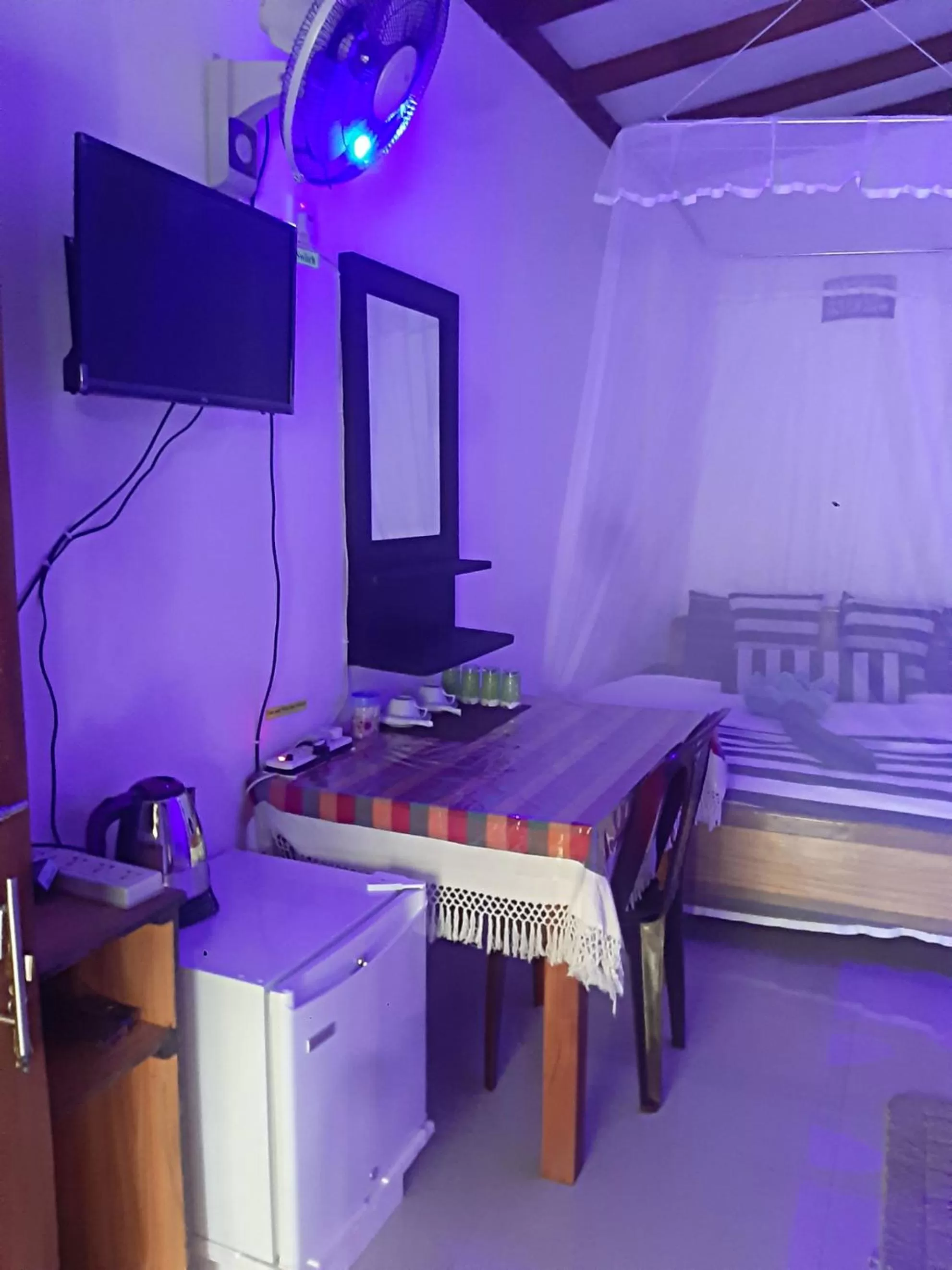 Property building, TV/Entertainment Center in Cozy Home Stay