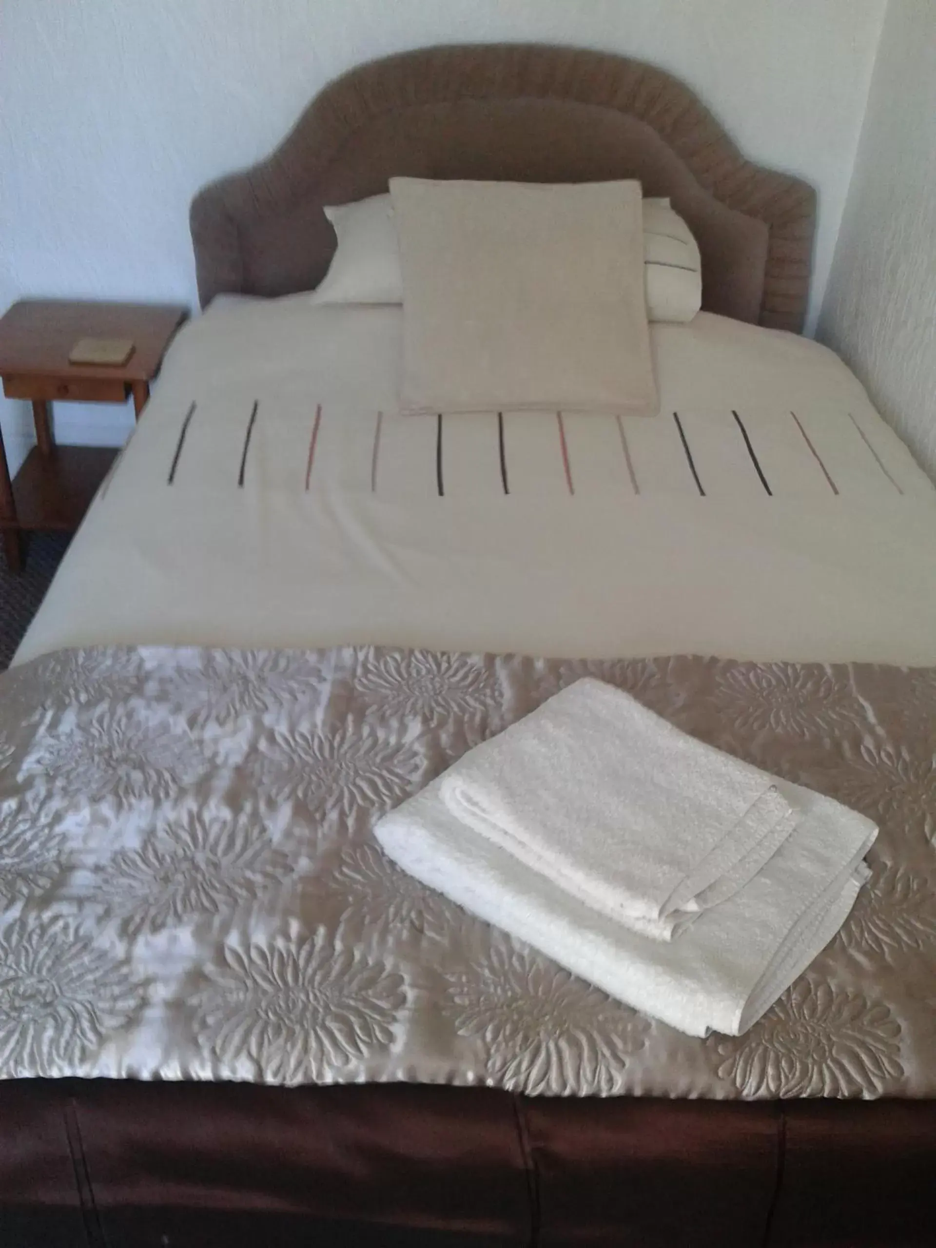 Bed in Legends Hotel