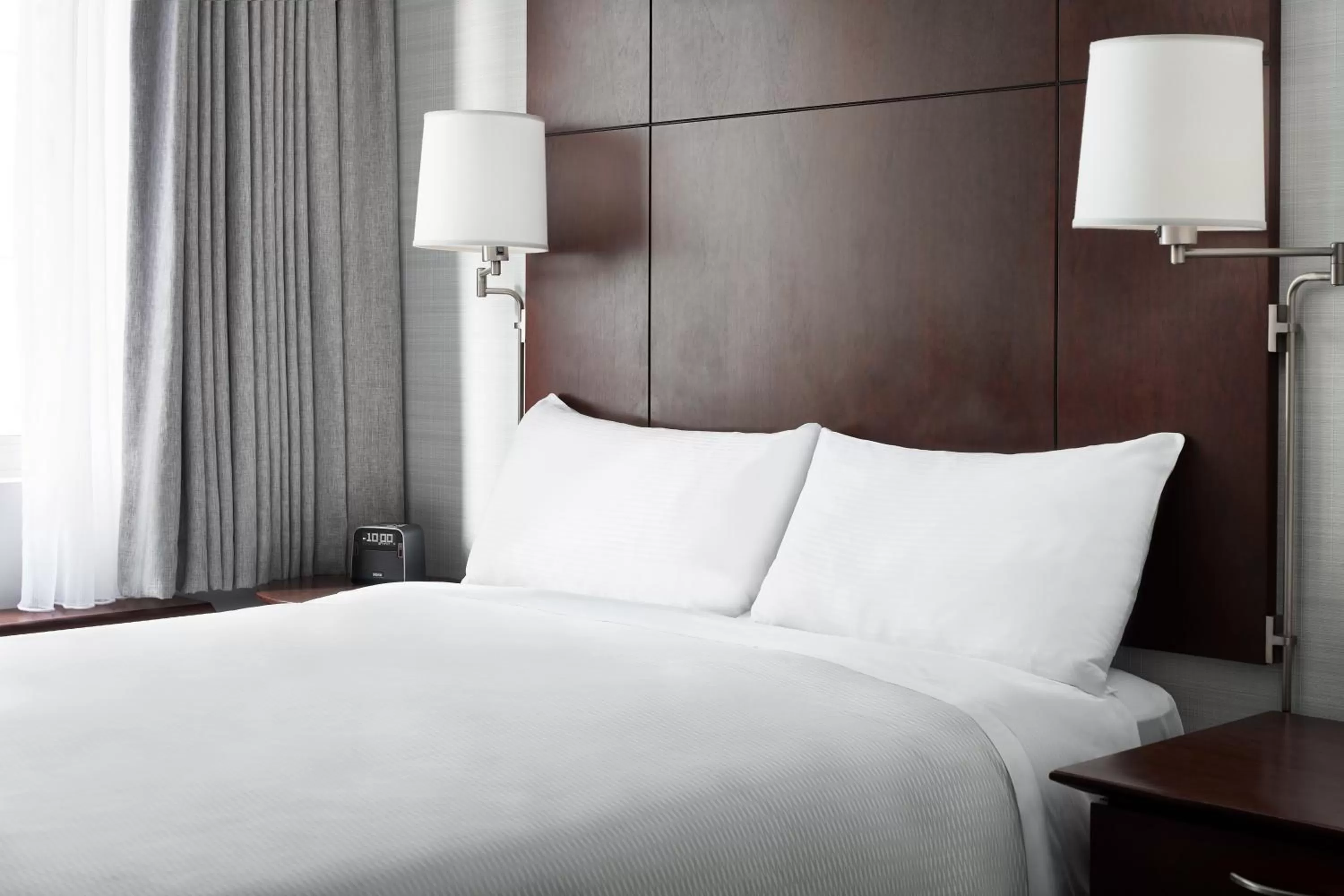 Bed in Club Quarters Hotel Embarcadero, San Francisco