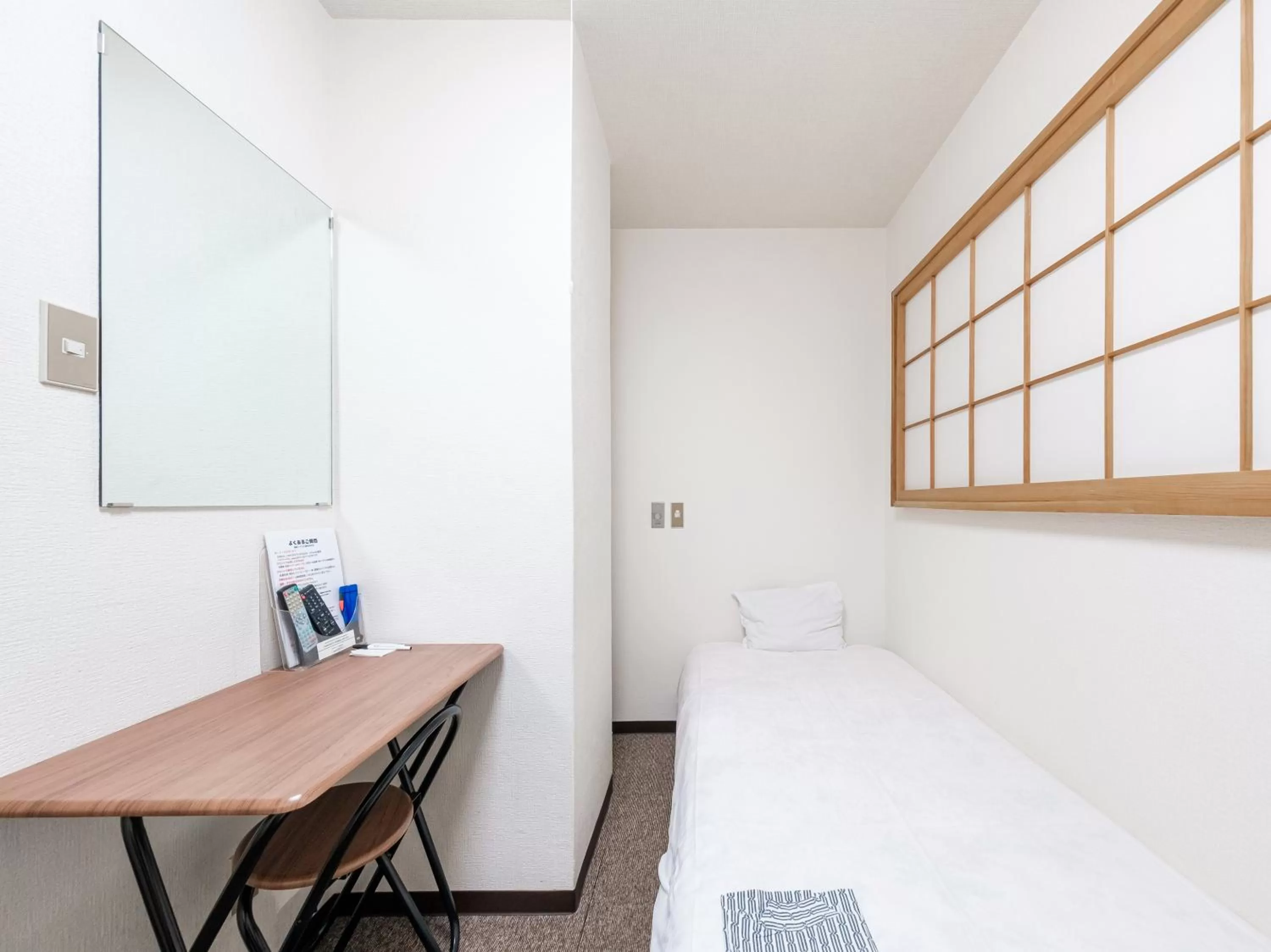Bed in Tabist Hotel Tetora Hakodate Station