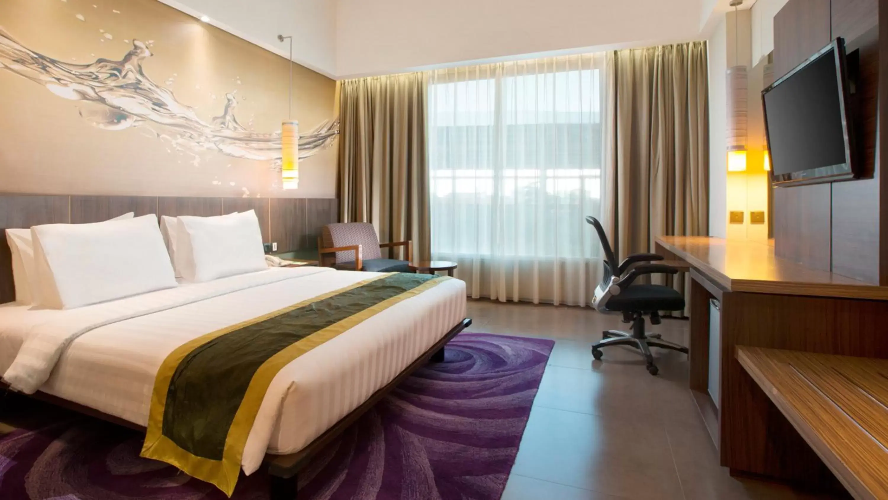 Photo of the whole room, Bed in Holiday Inn Bandung Pasteur, an IHG Hotel