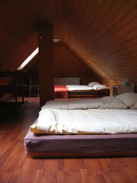 Bed in Auberge du Prévoux