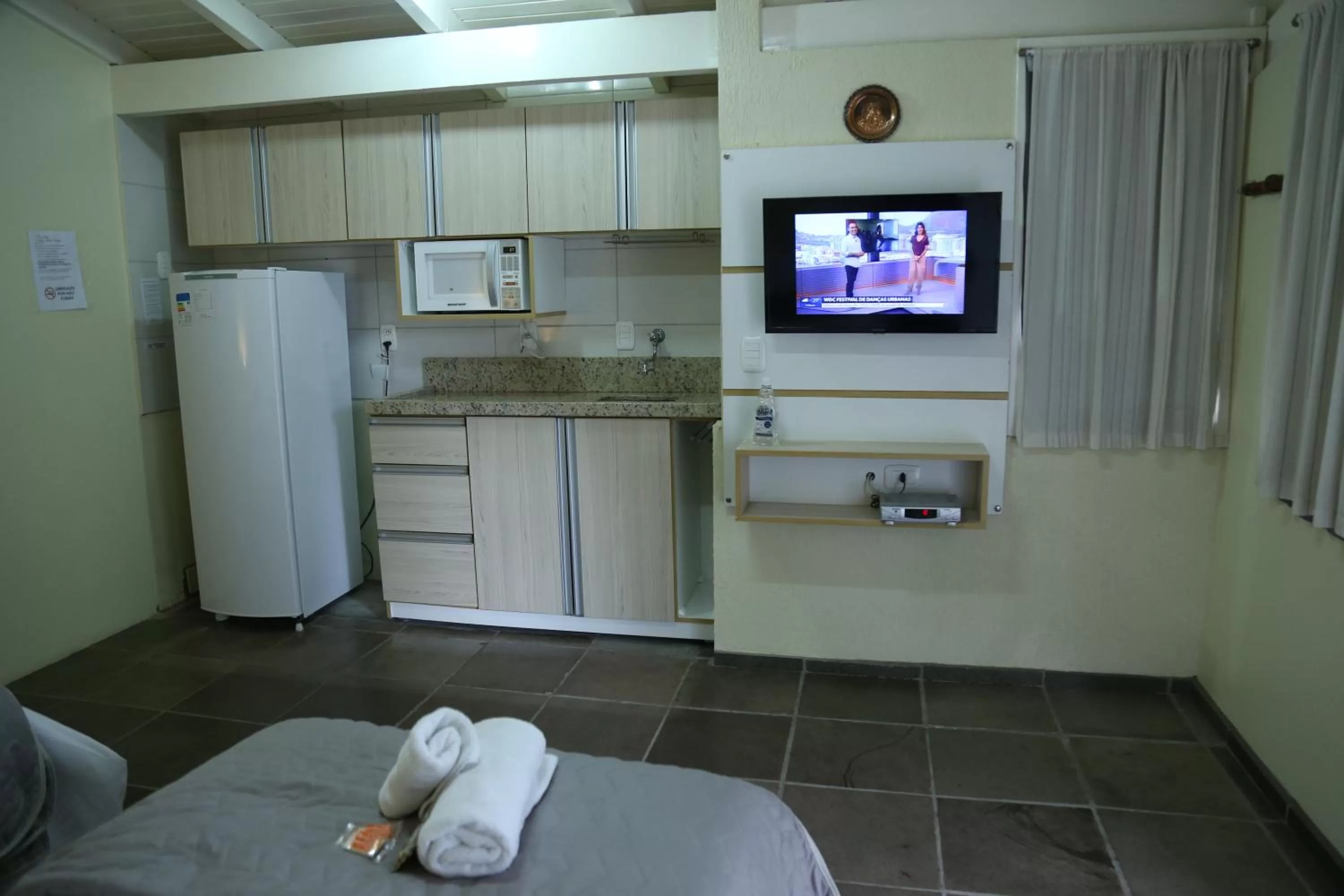 TV/Entertainment Center in Pousada Lanai Canela