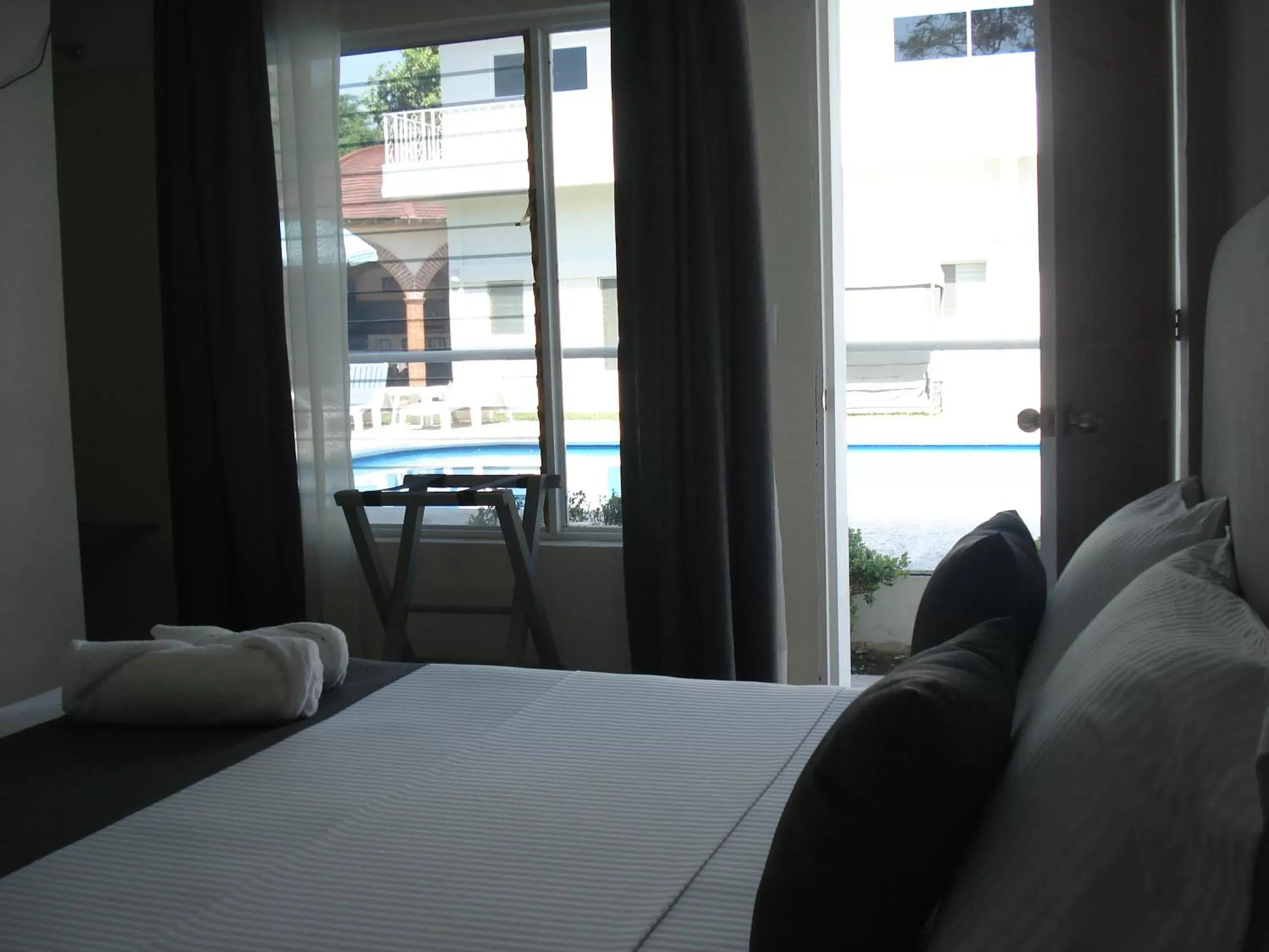 Pool view, Bed in AOHOM SANTUARIO HOTEL & SPA