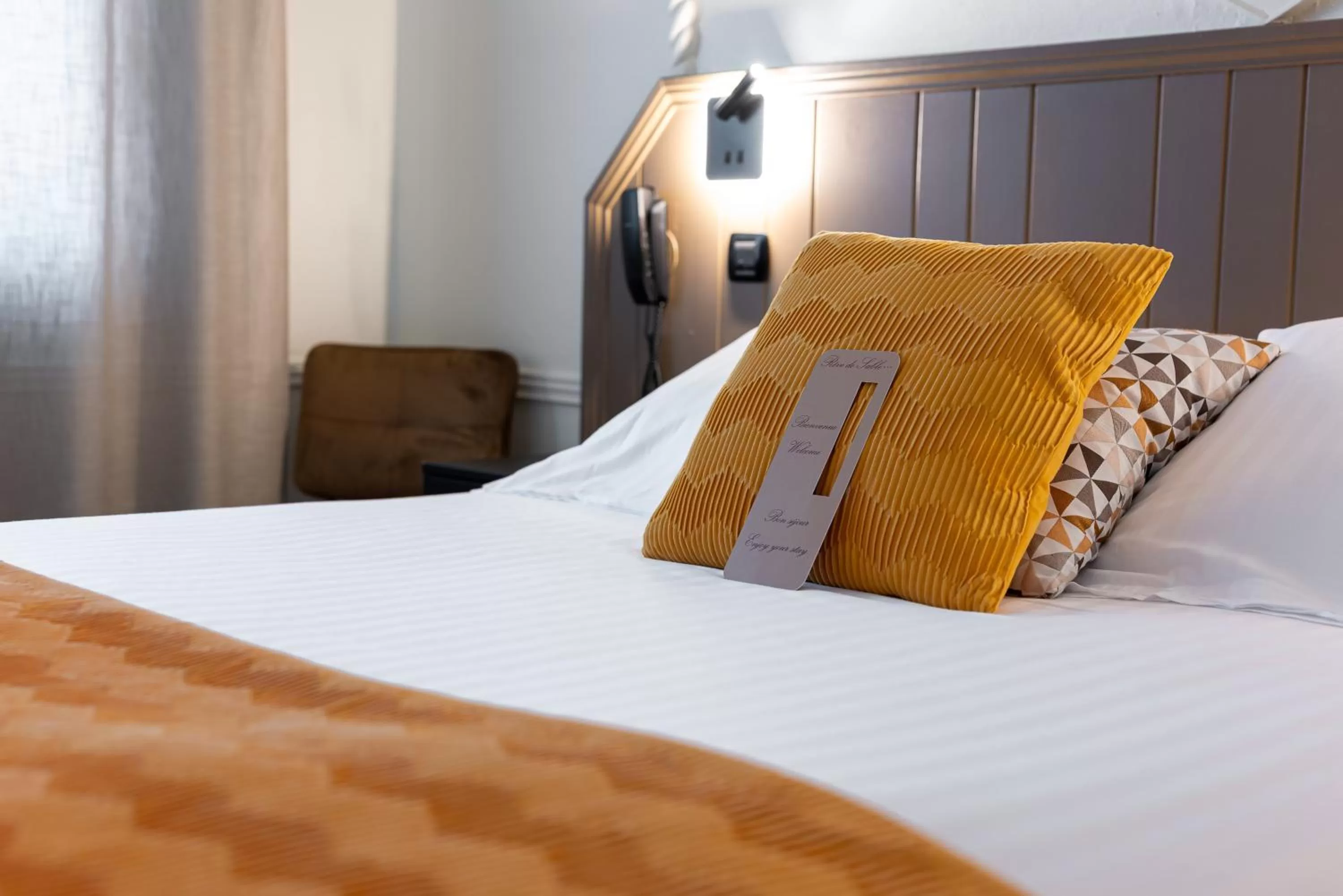 Bed in Logis Hôtel Rêve de Sable