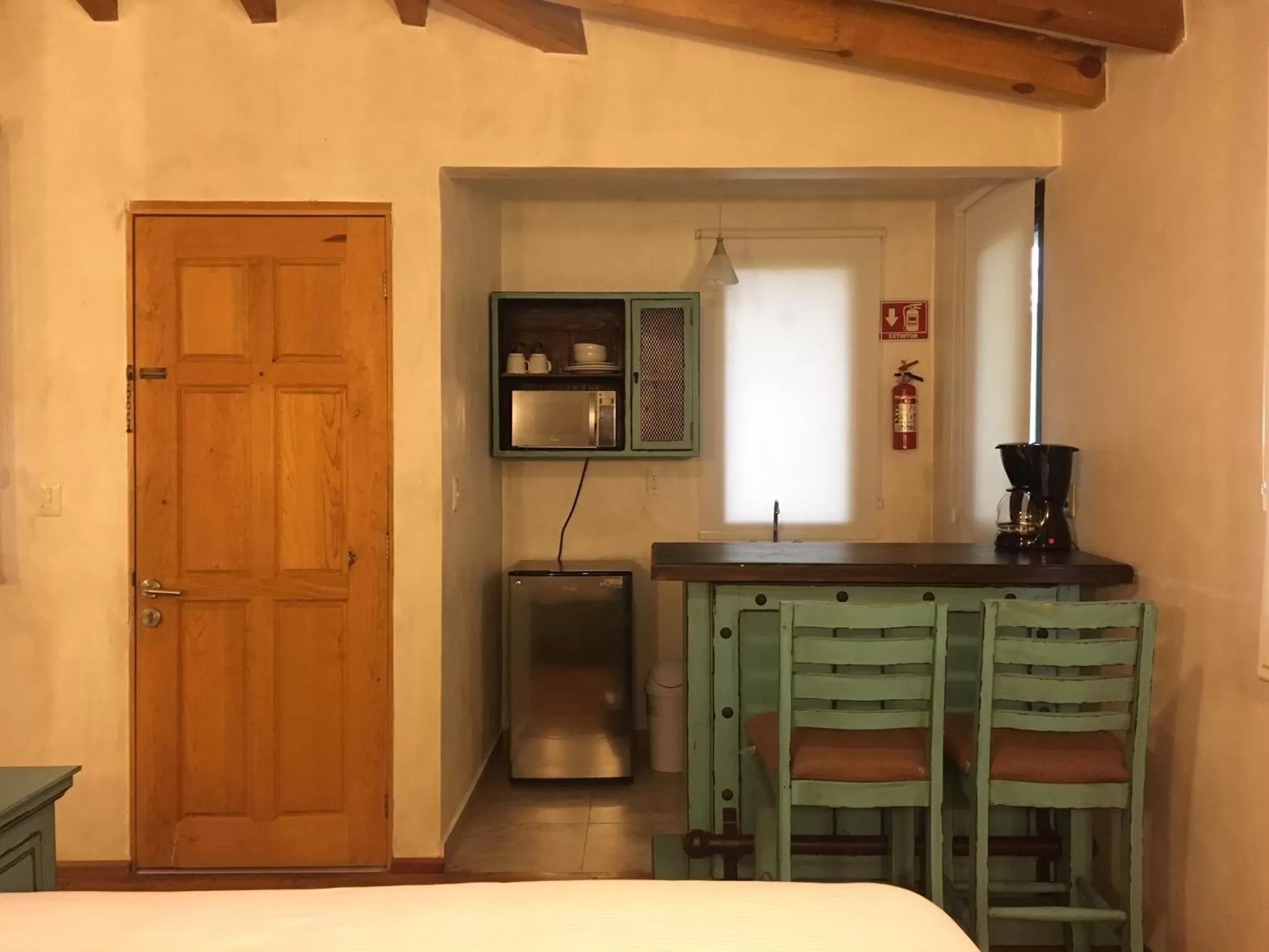 Kitchen or kitchenette, Bed in Hacienda Soltepec Suites Campo de Golf