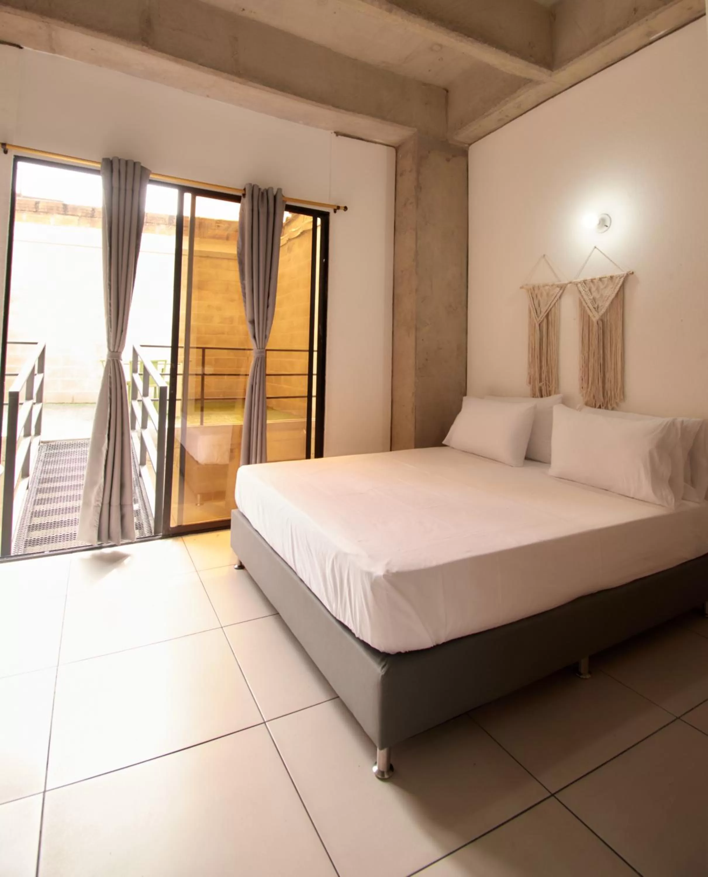 Bed in Mangata Living by Bernalo Hotels