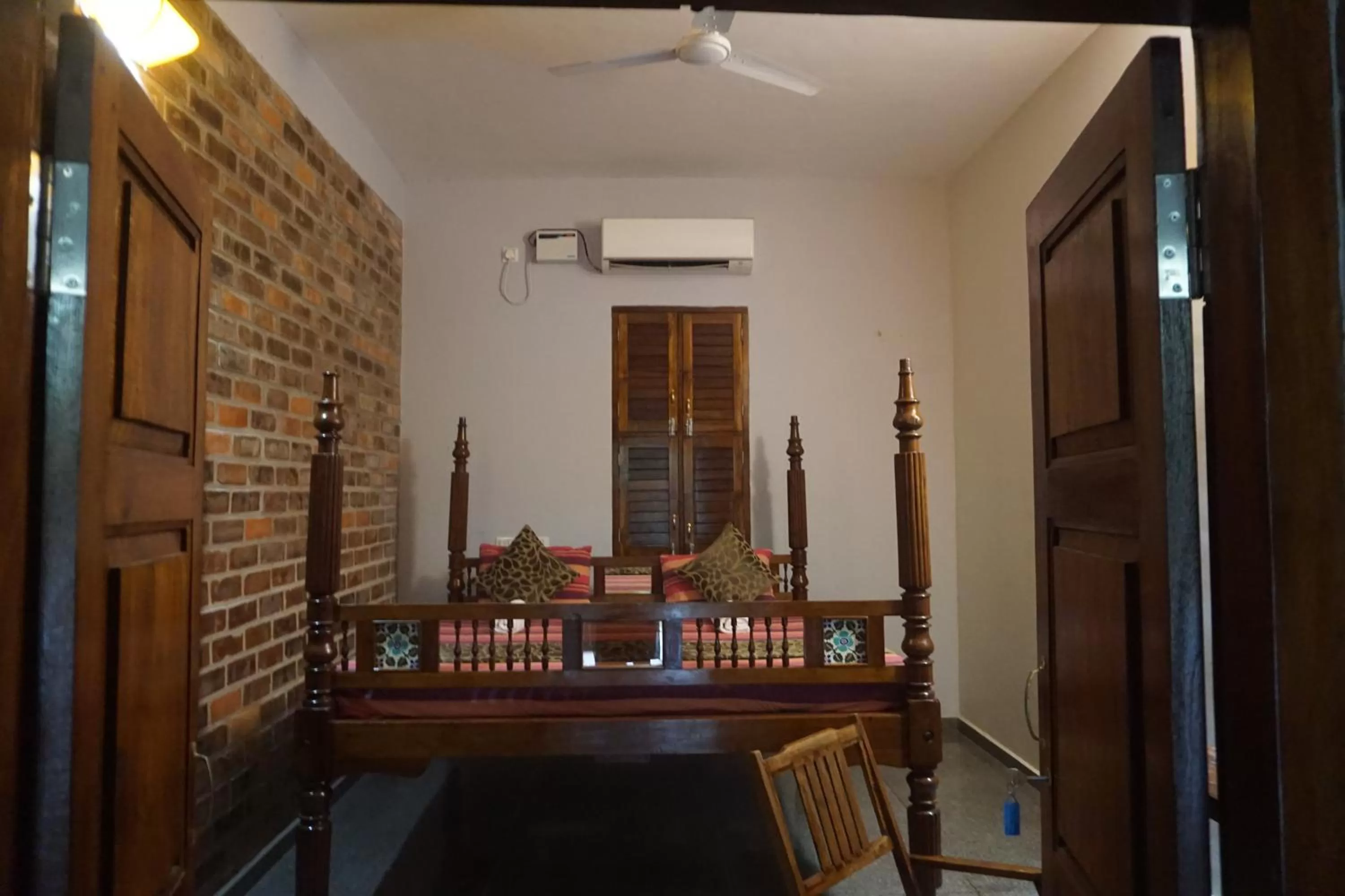 Bed, Seating Area in Green's Guest House