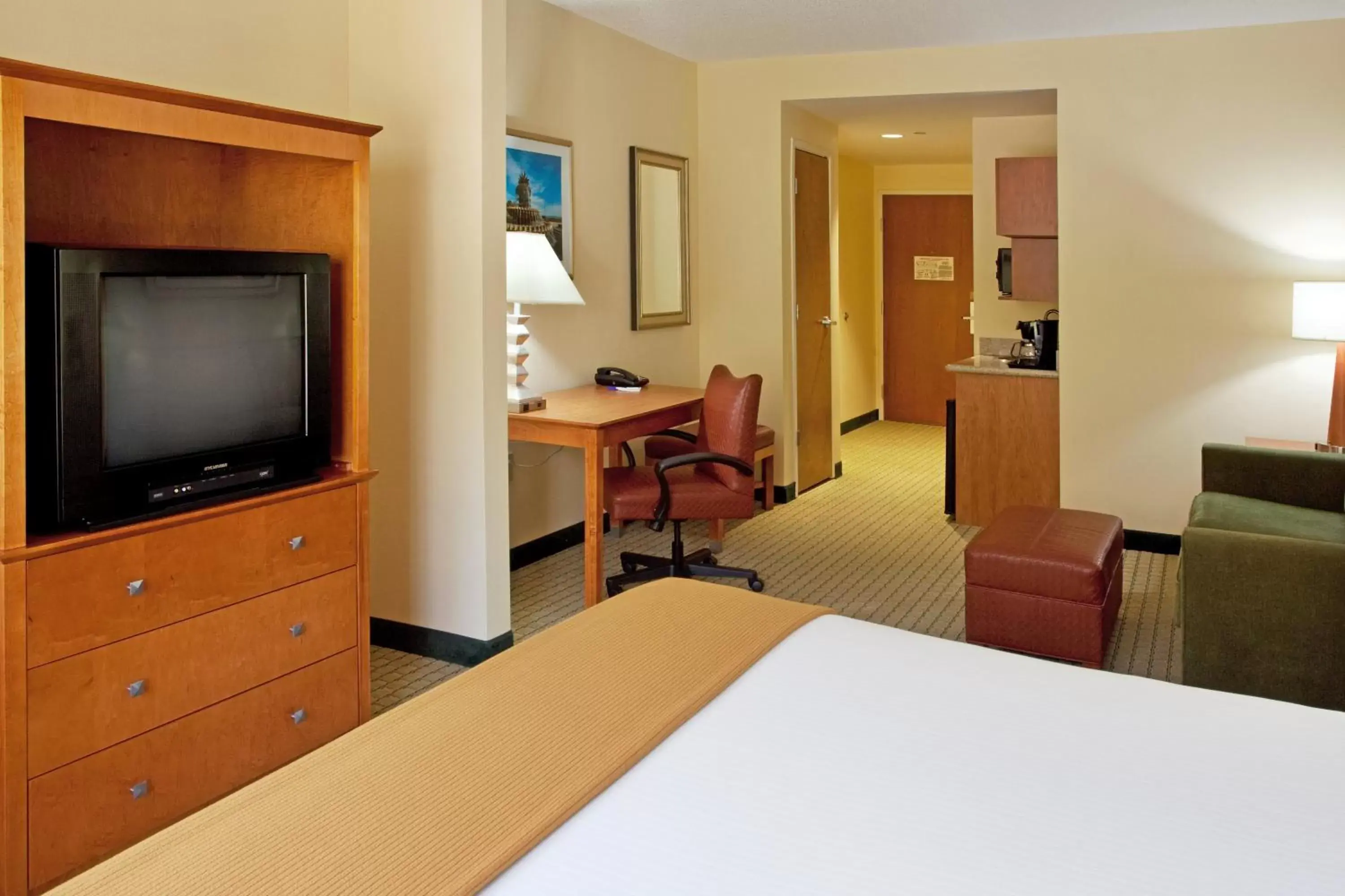 Photo of the whole room, TV/Entertainment Center in Holiday Inn Express Hotel & Suites Charleston - North, an IHG Hotel