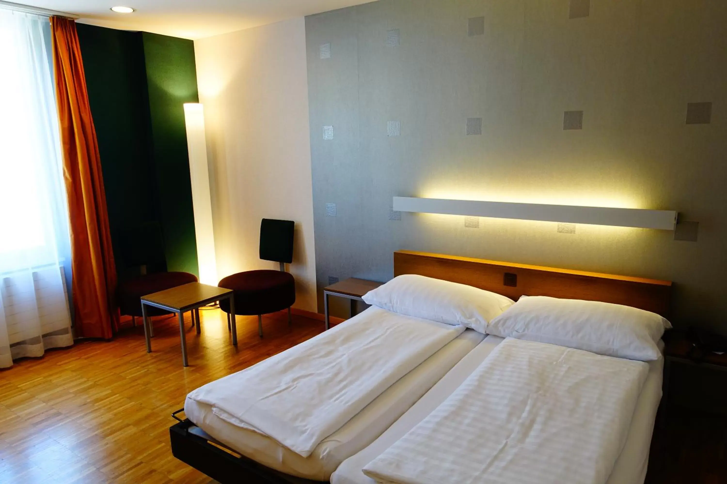 Bed in Hotel Schweizerhof