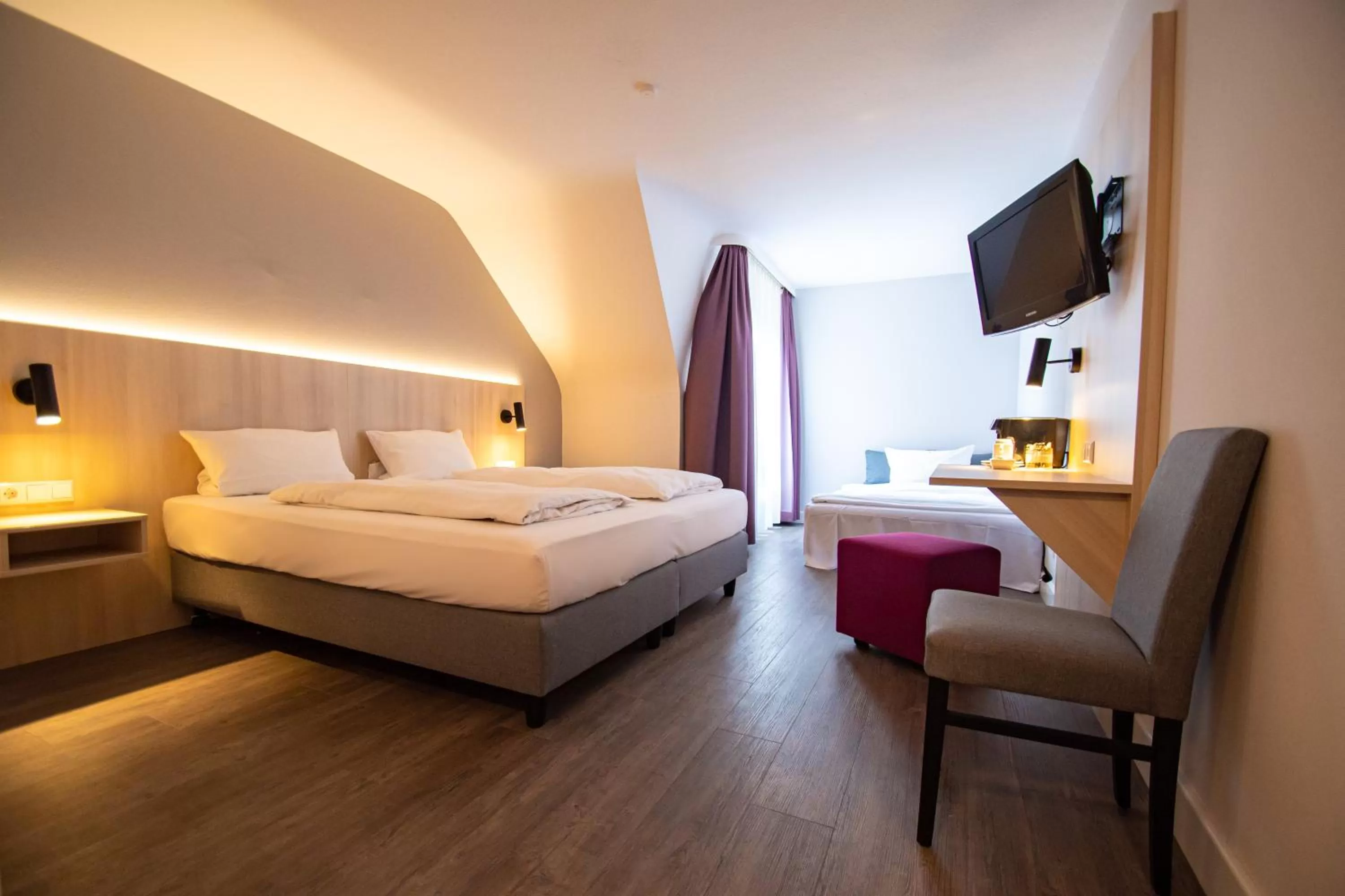 Photo of the whole room, Bed in Taste Hotel Hockenheim