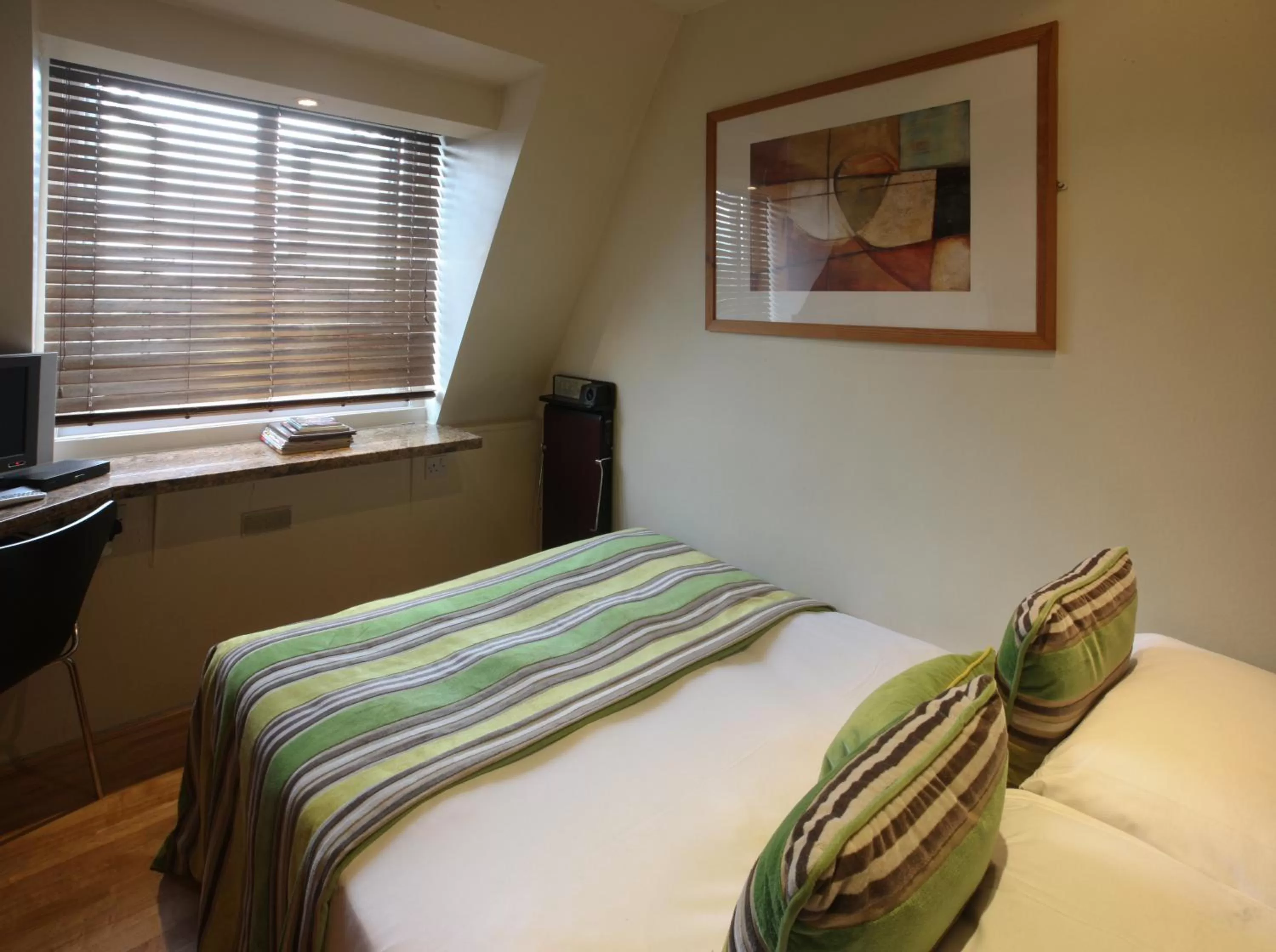 Bed in Mayflower Hotel