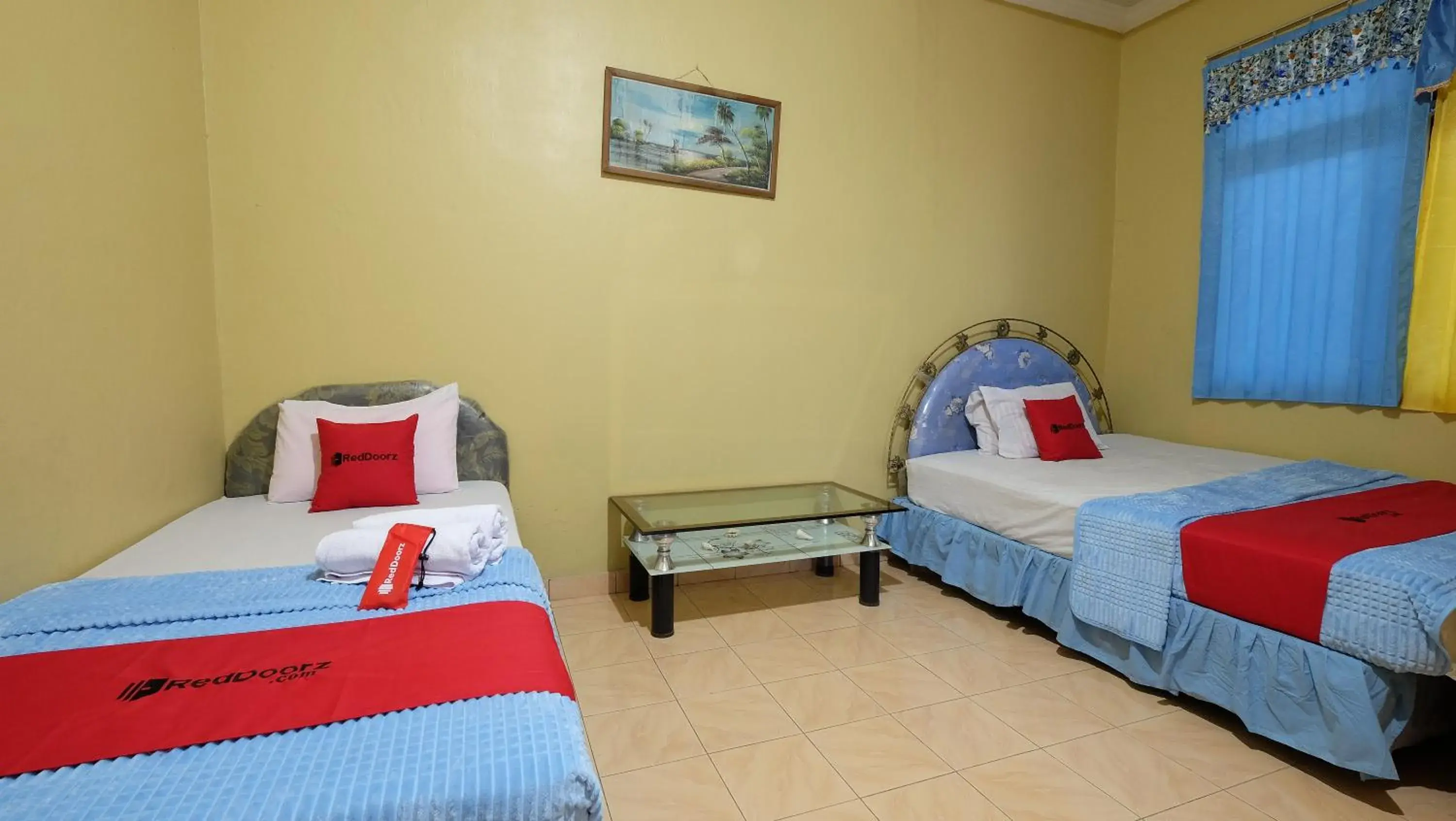 Bed in RedDoorz near Mangrove Forest Kupang Bed in RedDoorz near Mangrove Forest Kupang