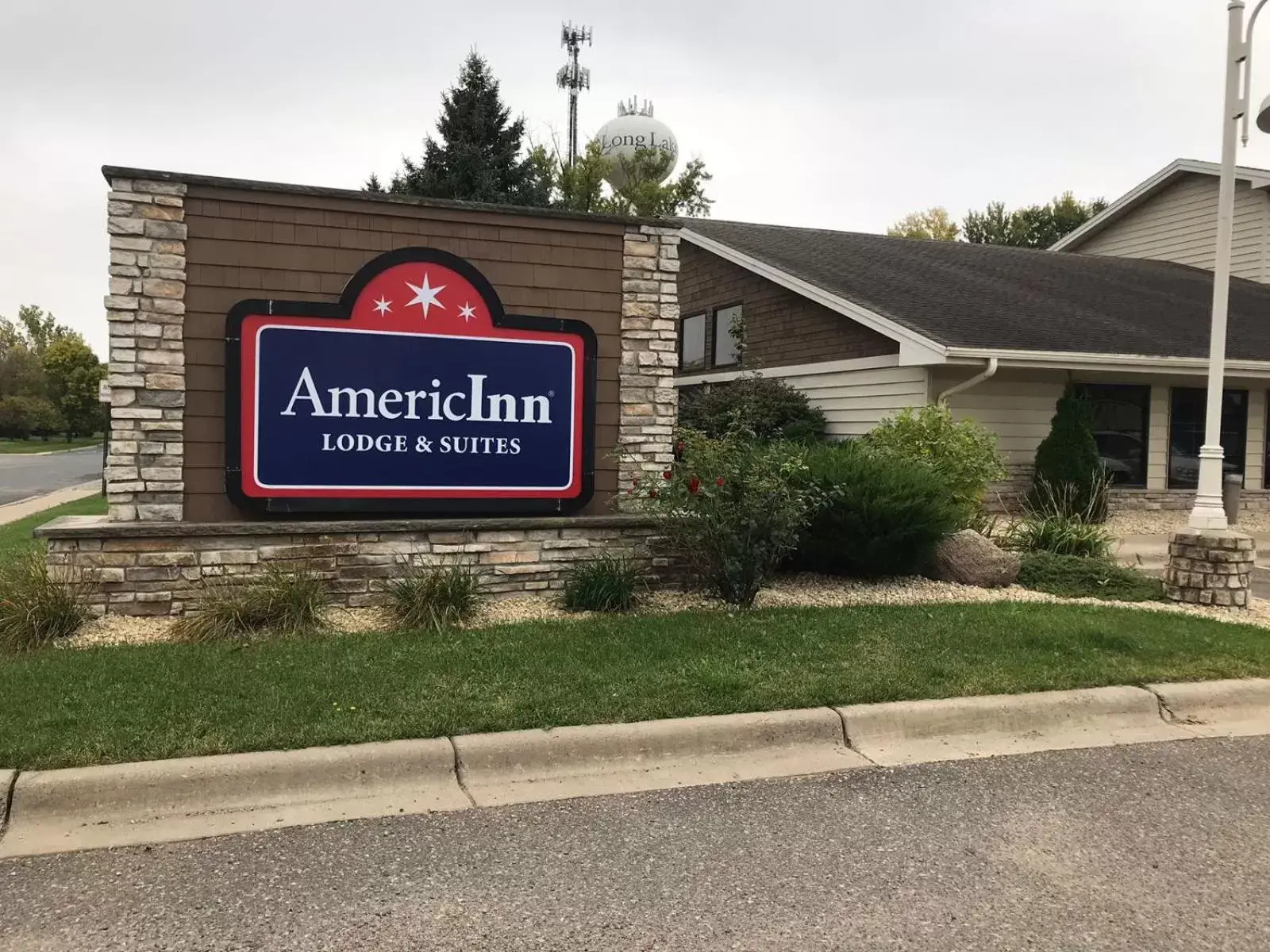 Property logo or sign, Property Building in AmericInn by Wyndham Hotel and Suites Long Lake