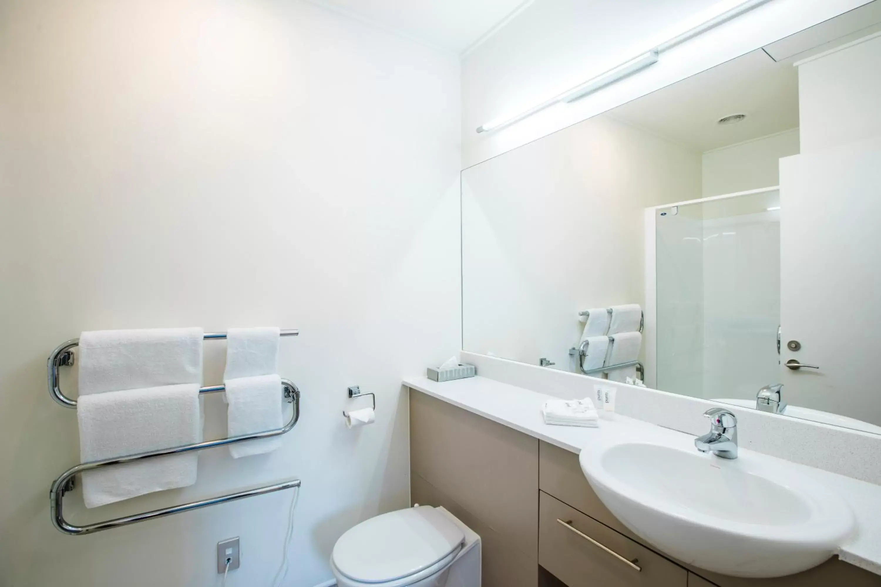 Bathroom in Quest On Lambton Serviced Apartments