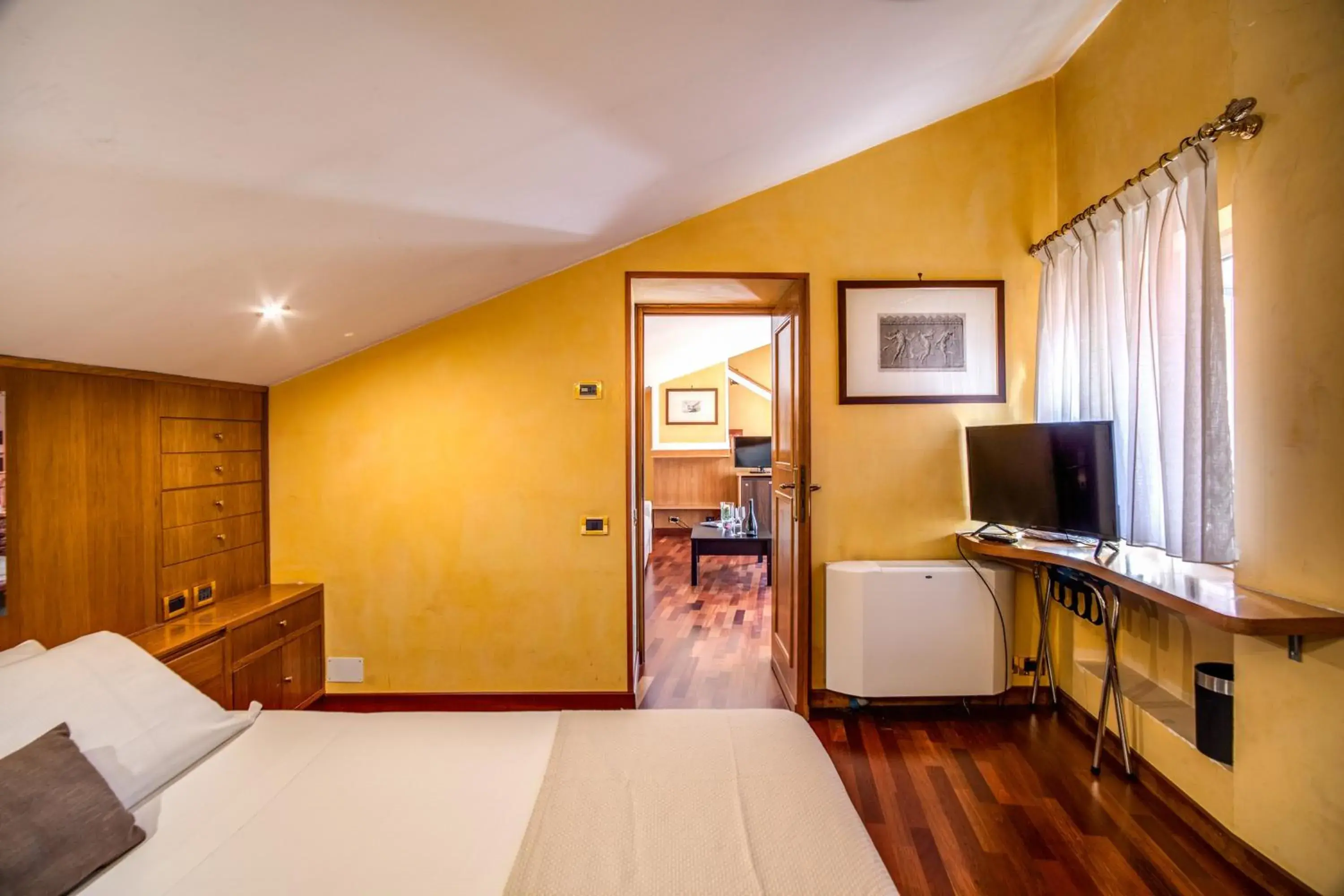 Bed, Kitchen/Kitchenette in Hotel Della Torre Argentina