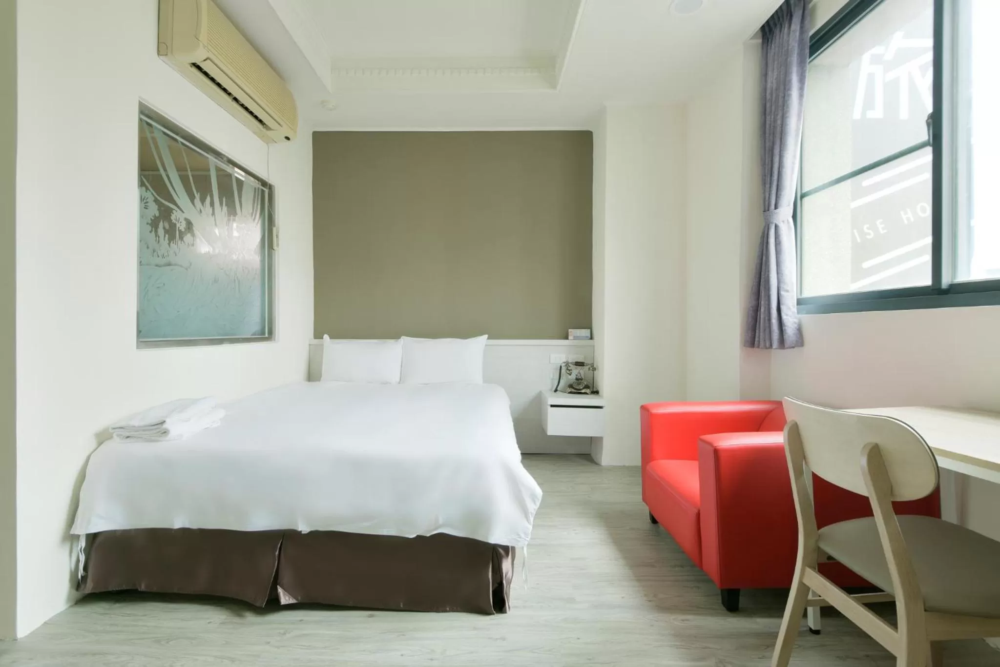 Bed in Raise Hotel Taichung