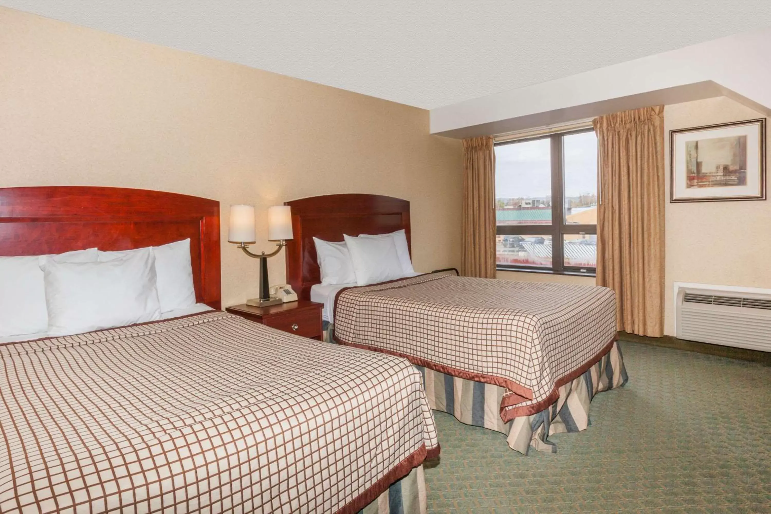 Photo of the whole room, Bed in Days Inn by Wyndham Utica