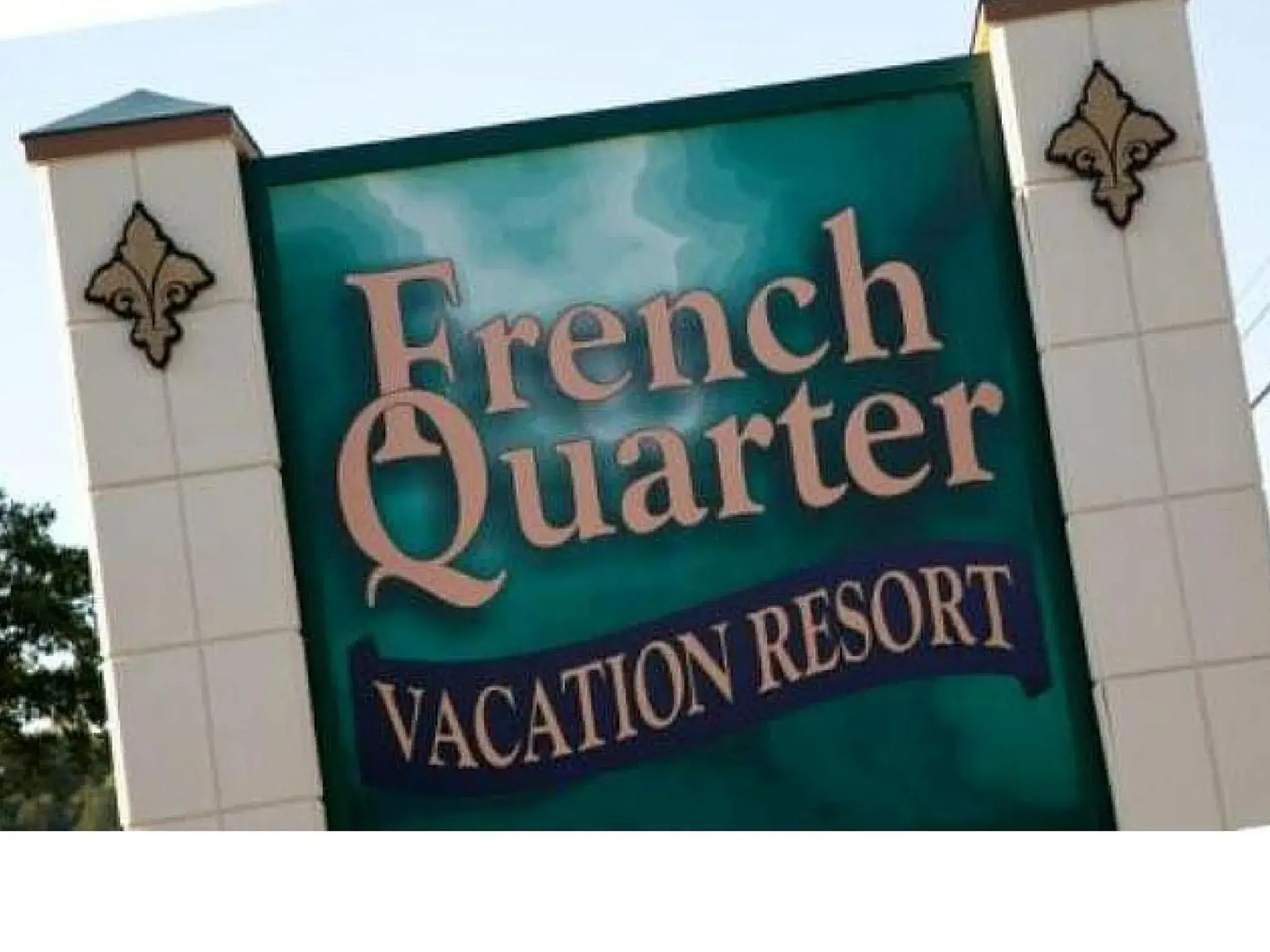 Property logo or sign in French Quarter Resort