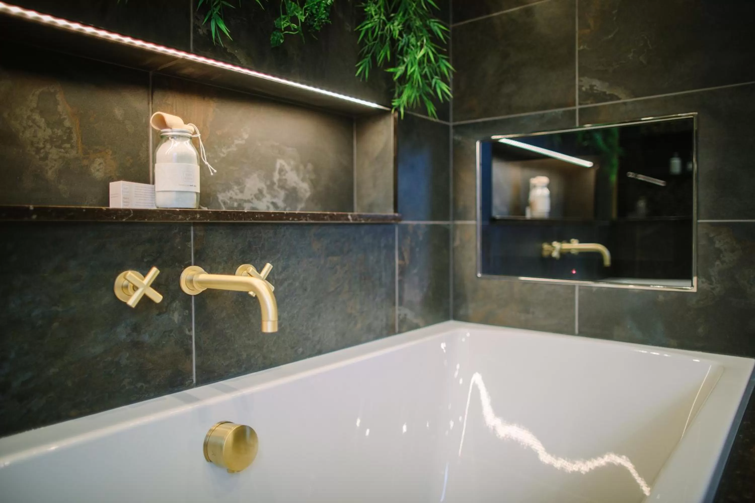 Bathroom in Absoluxe Suites