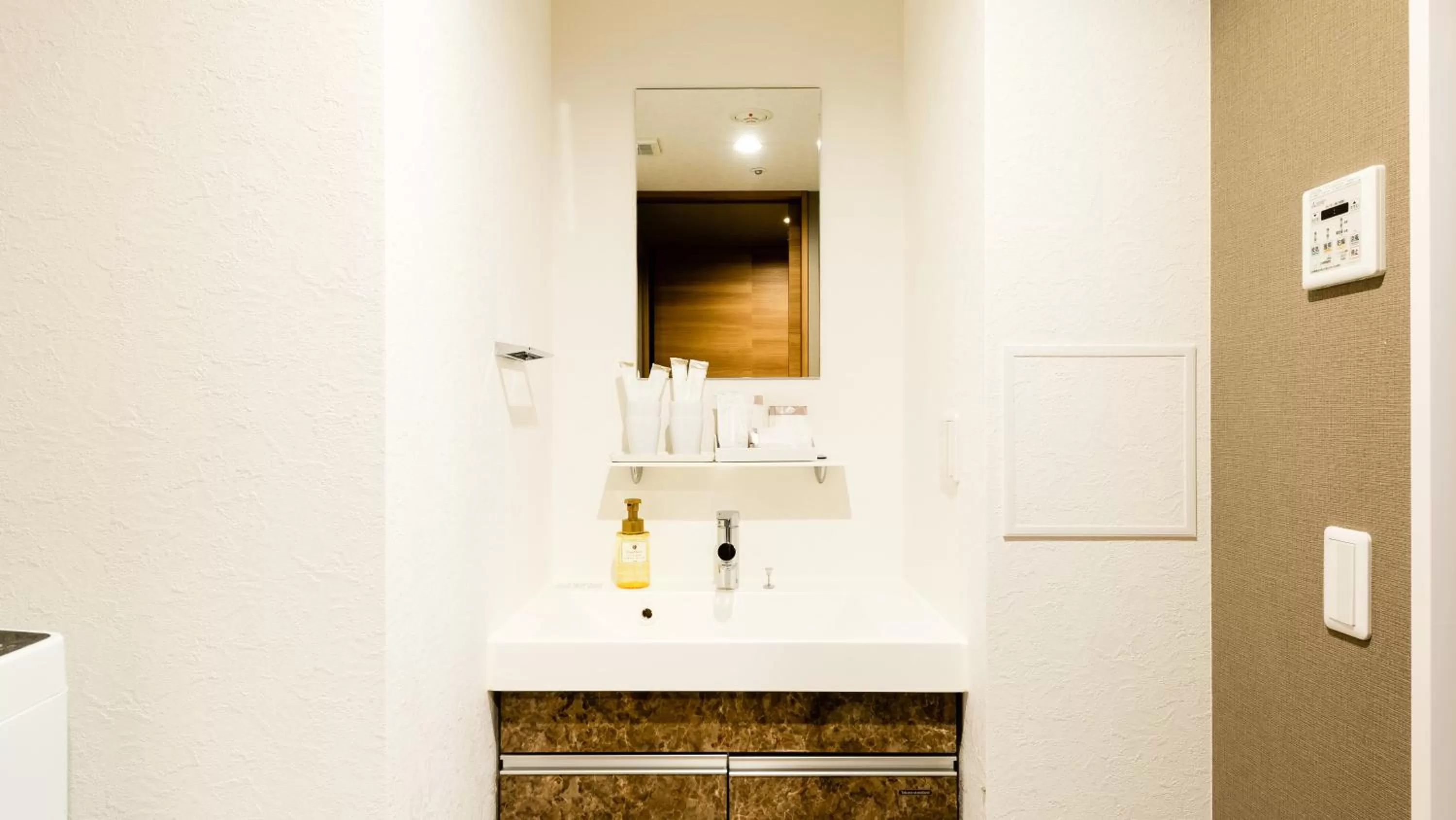 Photo of the whole room in Takuto Hotel Osaka Shinsaibashi