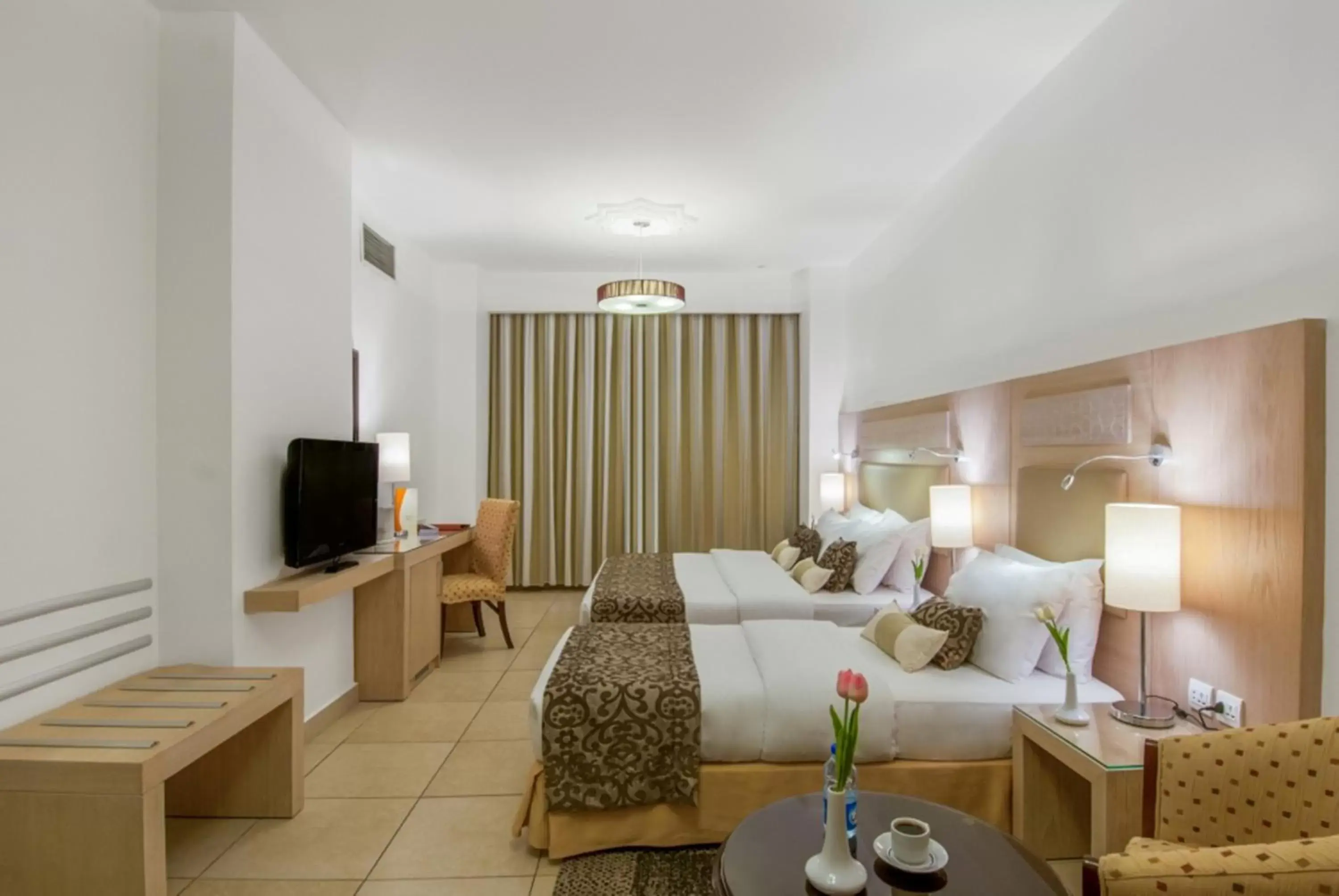 Bedroom in Toledo Amman Hotel