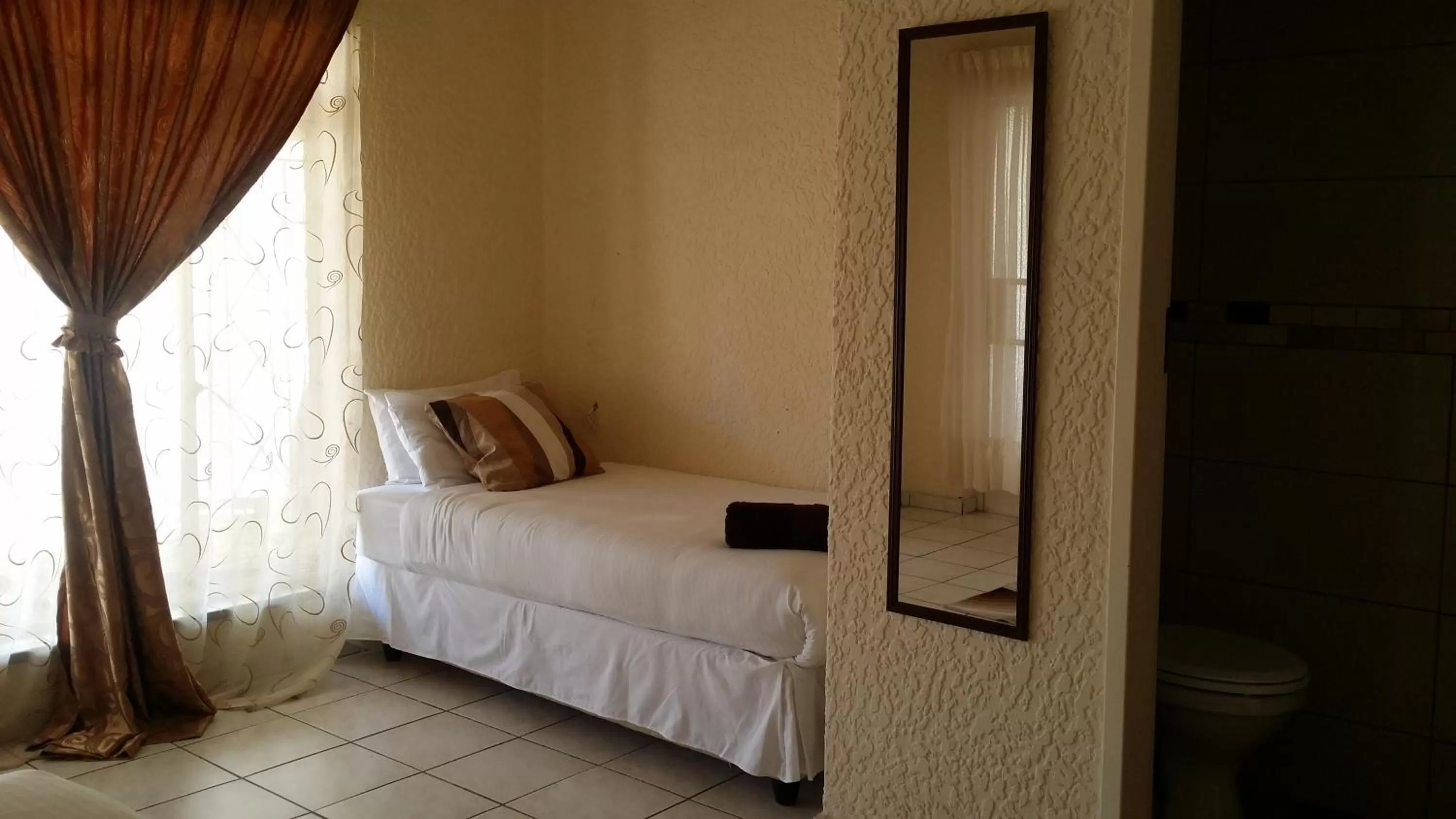 Bed in Moye Guest House