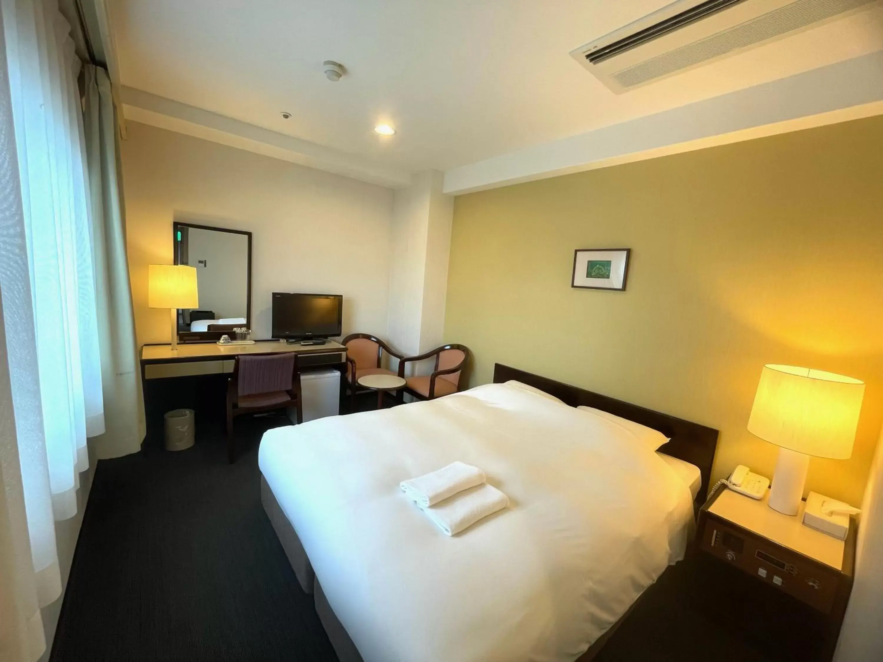 Photo of the whole room, Bed in Smile Hotel Yonago