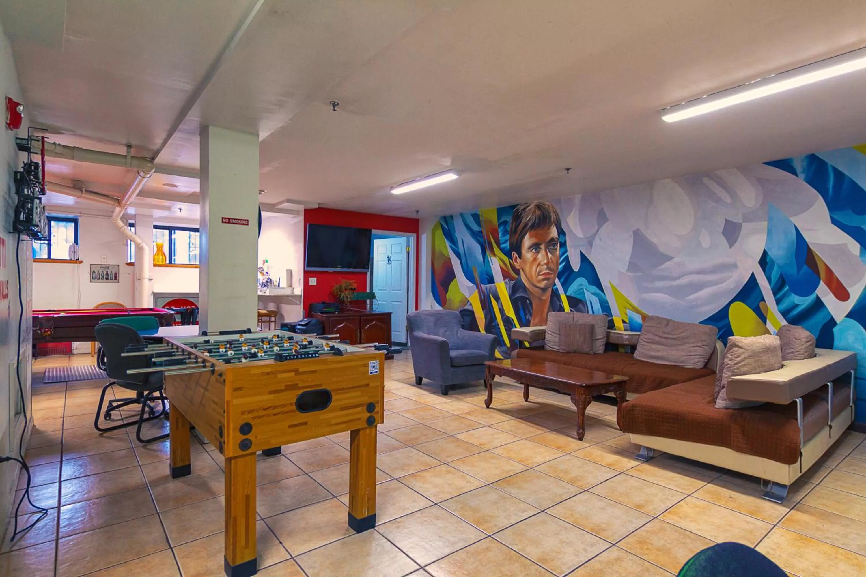 Communal lounge/ TV room in NY Moore Hostel