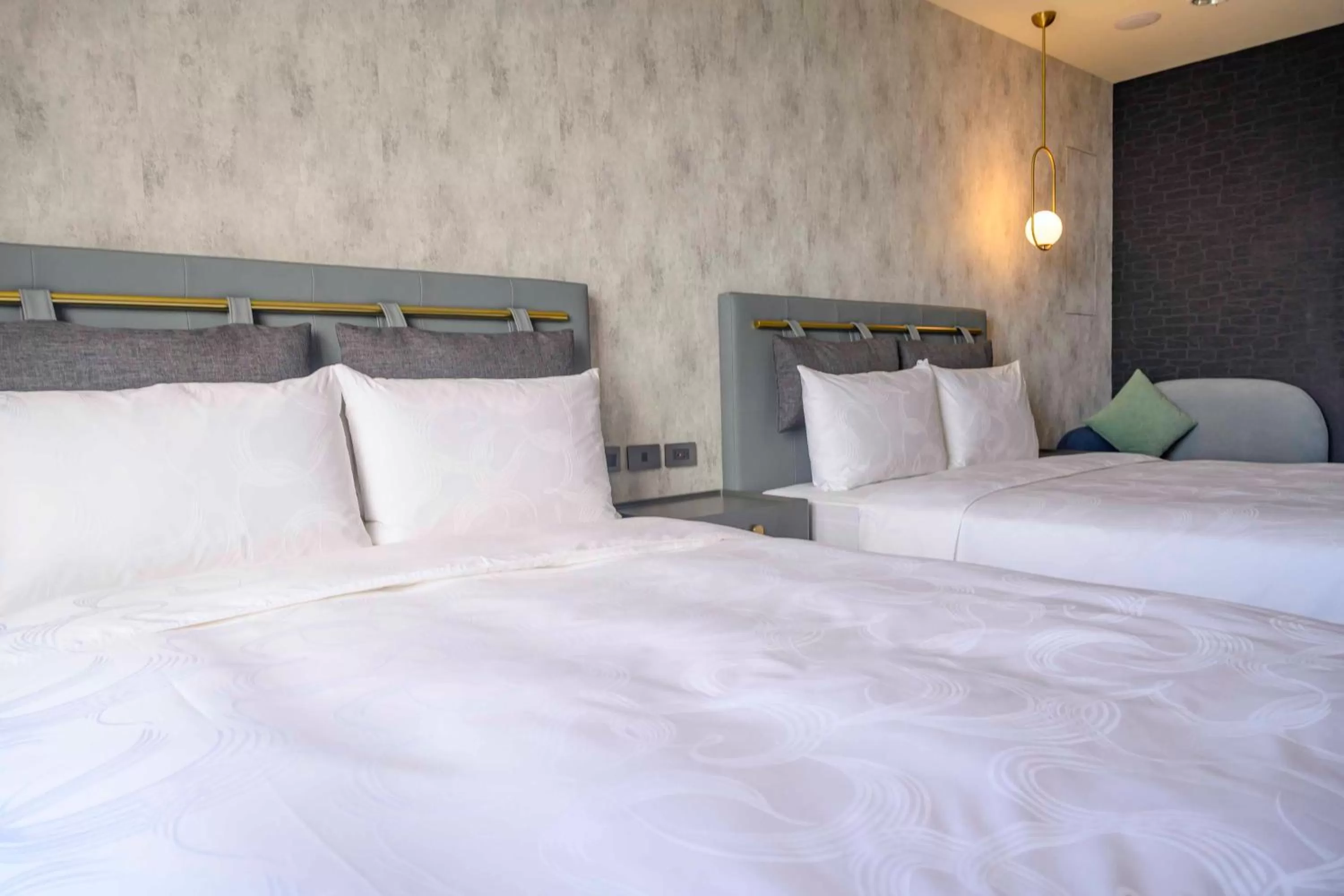 Bed in Tenz Go Hotel