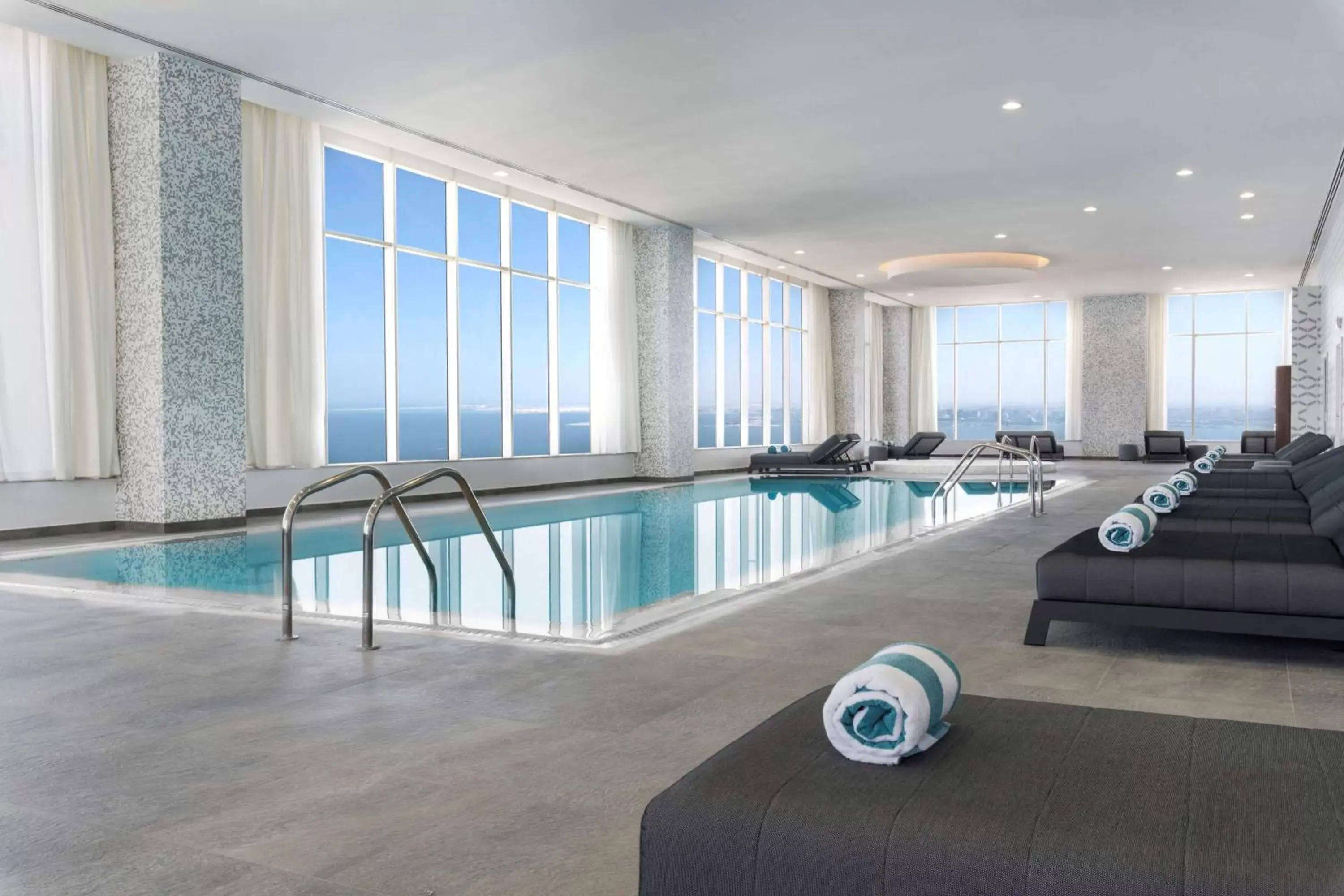 Swimming Pool in Aleph Doha Residences, Curio Collection By Hilton