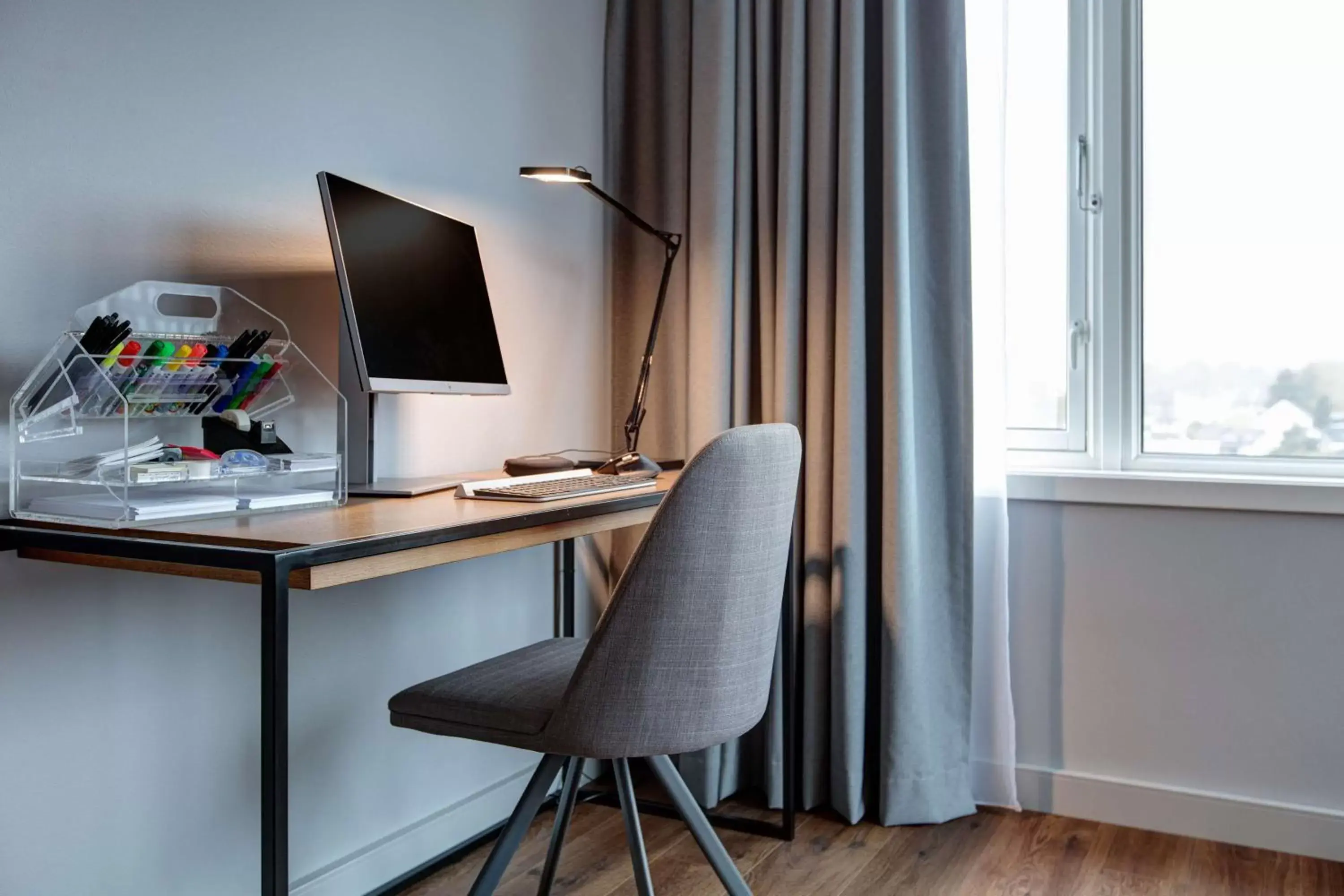 Photo of the whole room, TV/Entertainment Center in Radisson Blu Hotel Nydalen, Oslo