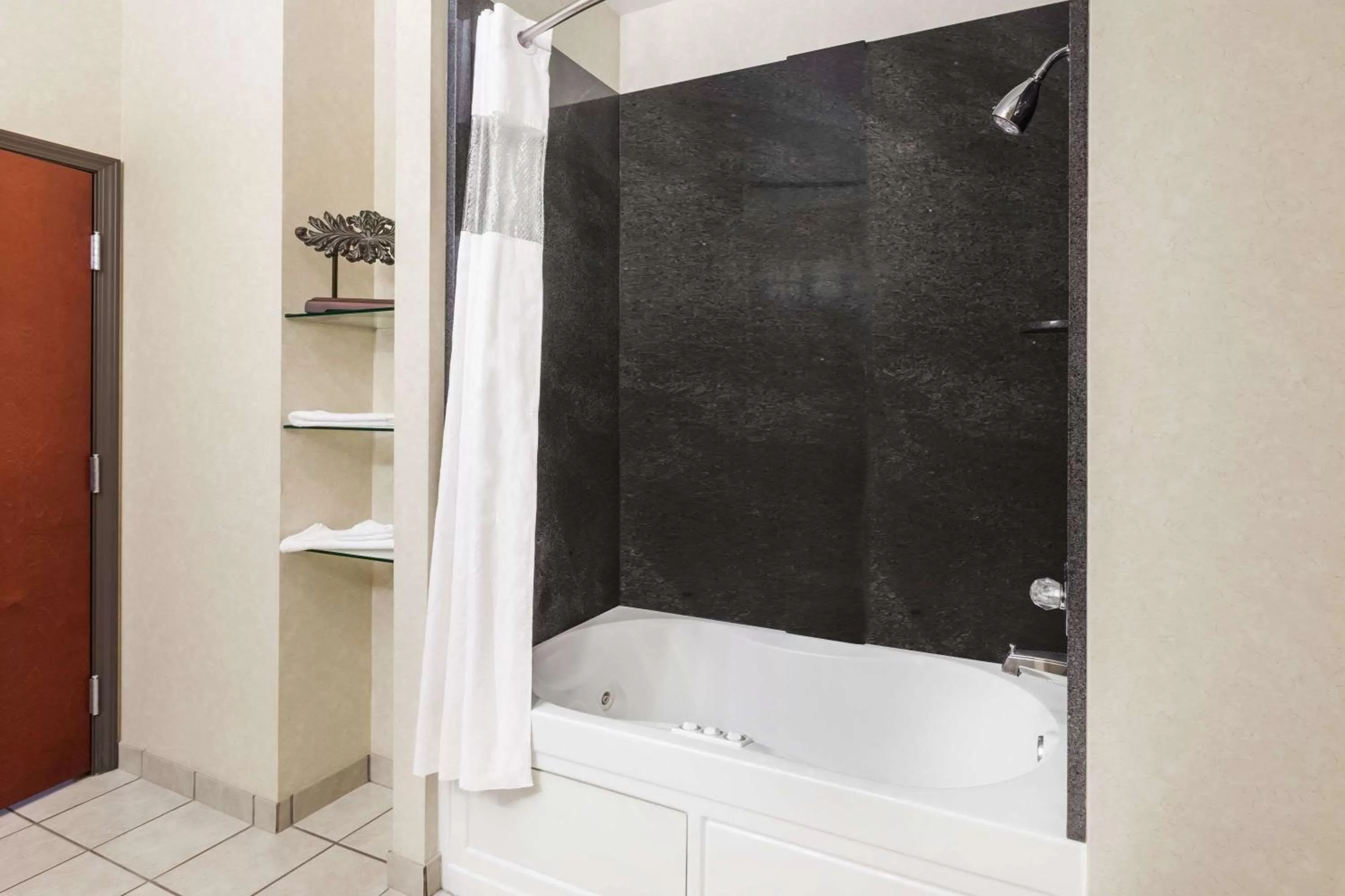 Bathroom in Baymont by Wyndham Henderson