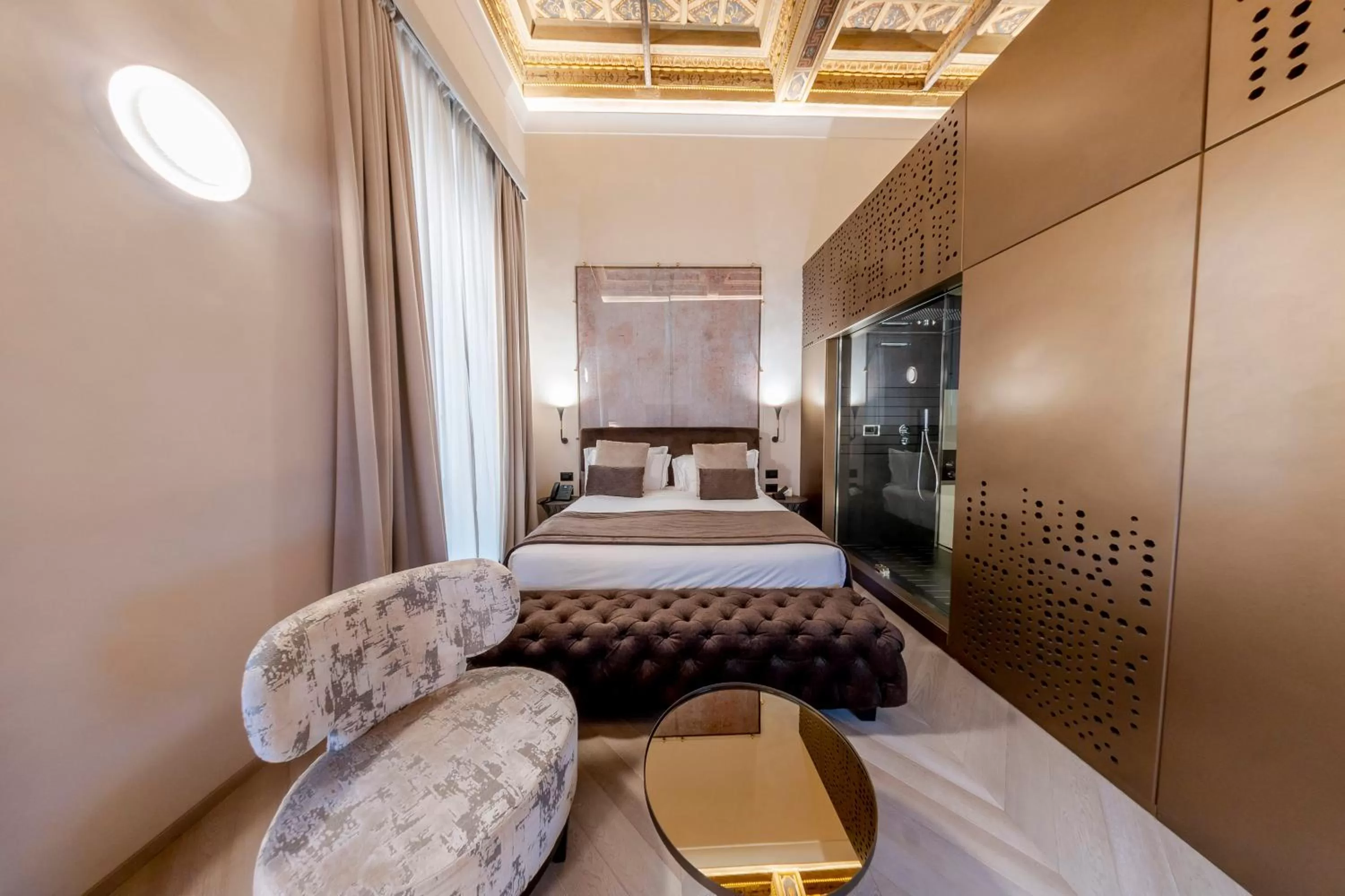 Bed in Martius Private Suites Hotel