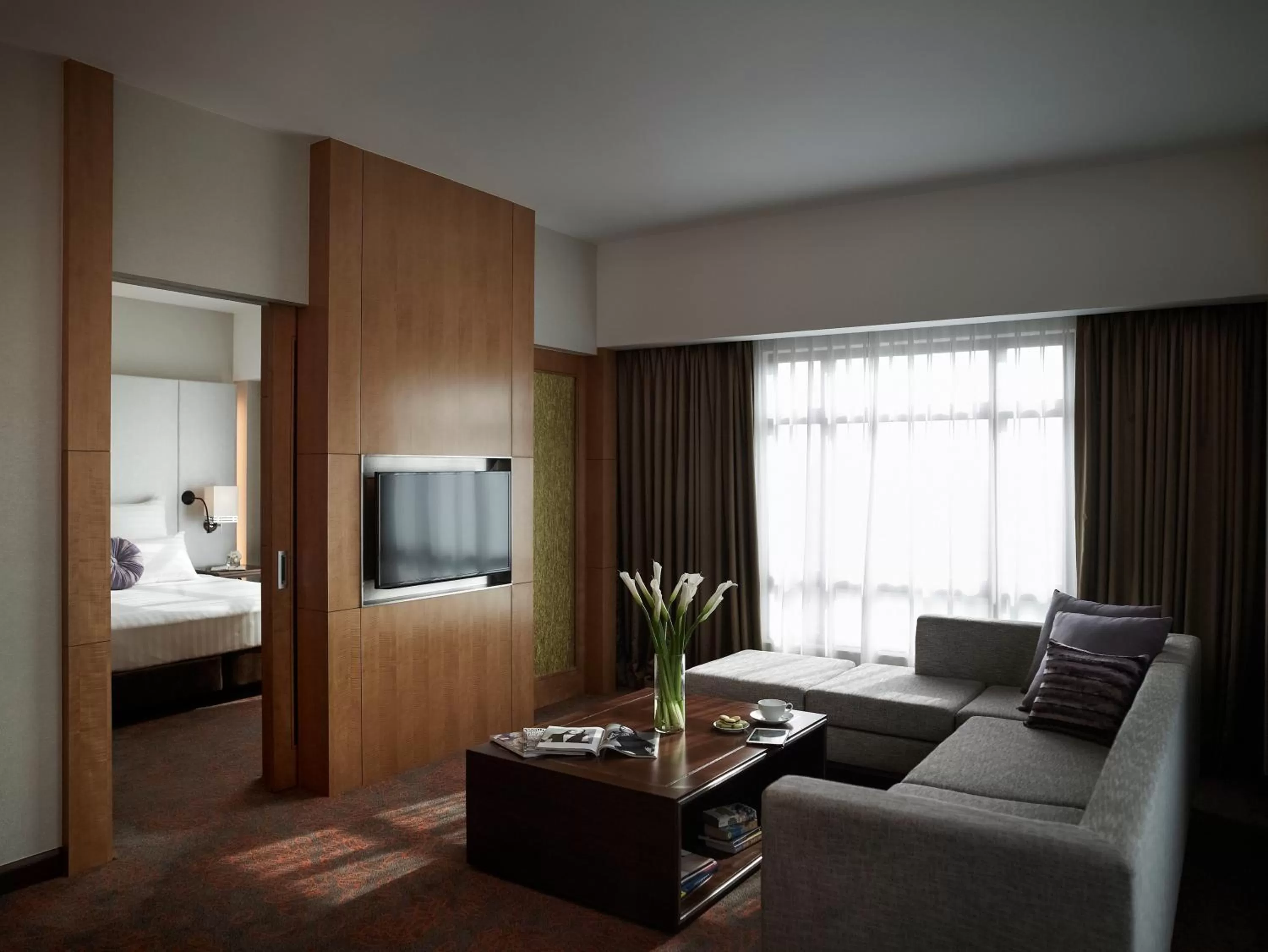 Living room, Bed in Pullman Hanoi