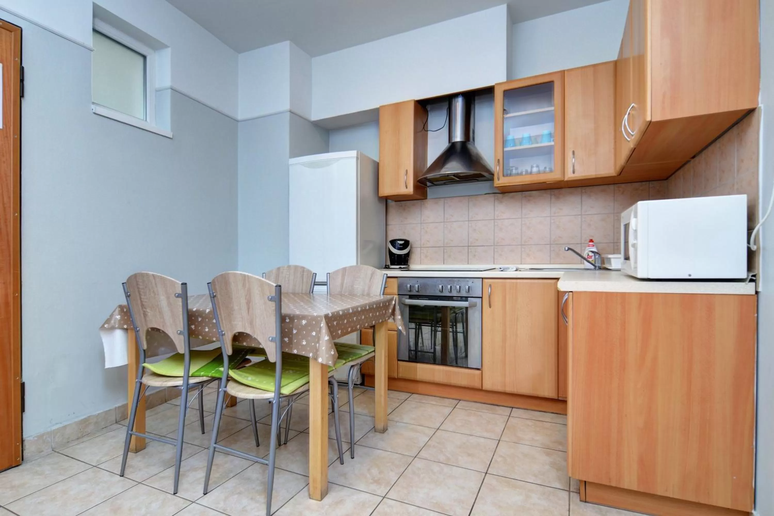 Kitchen or kitchenette in Agape Apartments