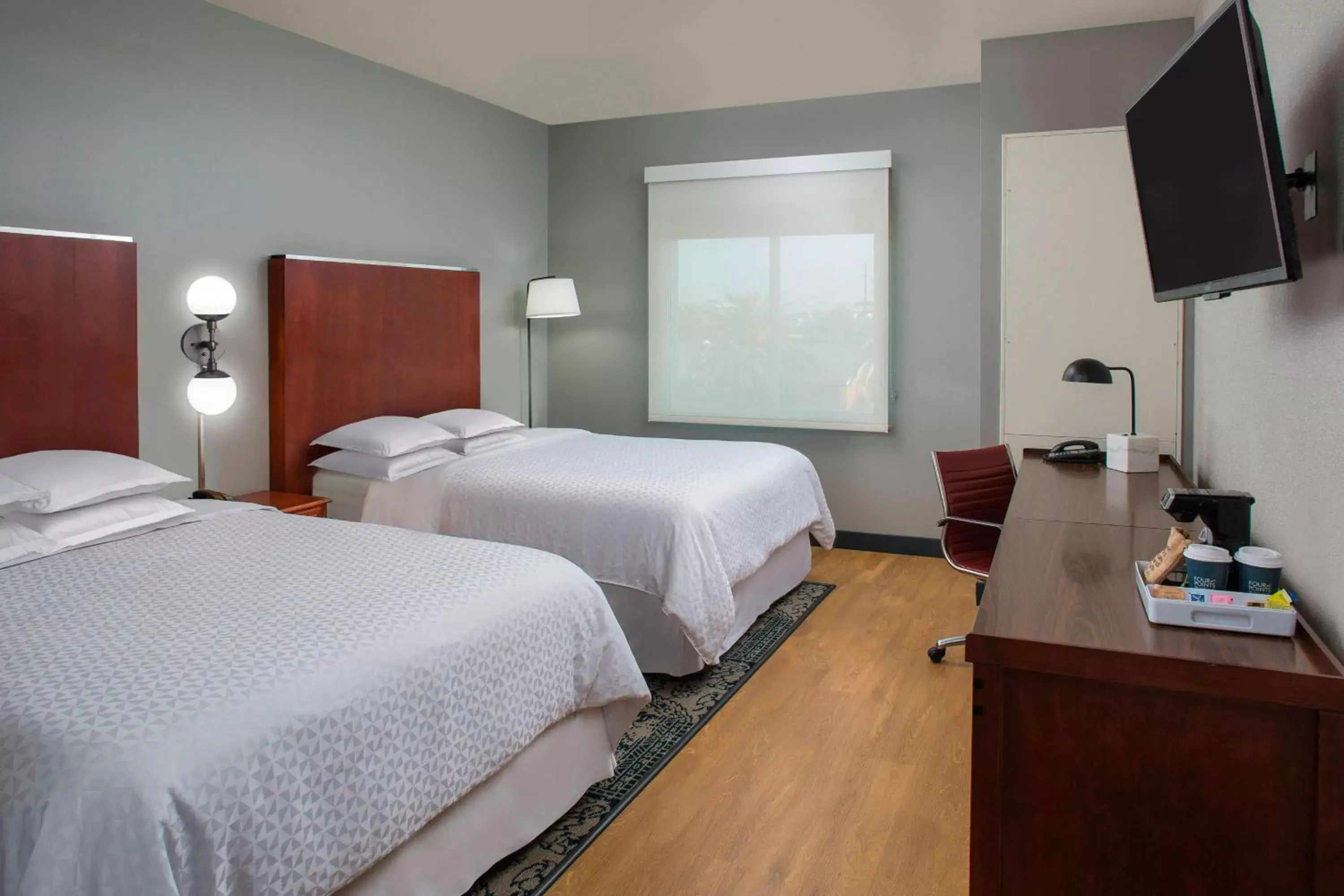 Photo of the whole room, Bed in Four Points by Sheraton Houston Hobby Airport