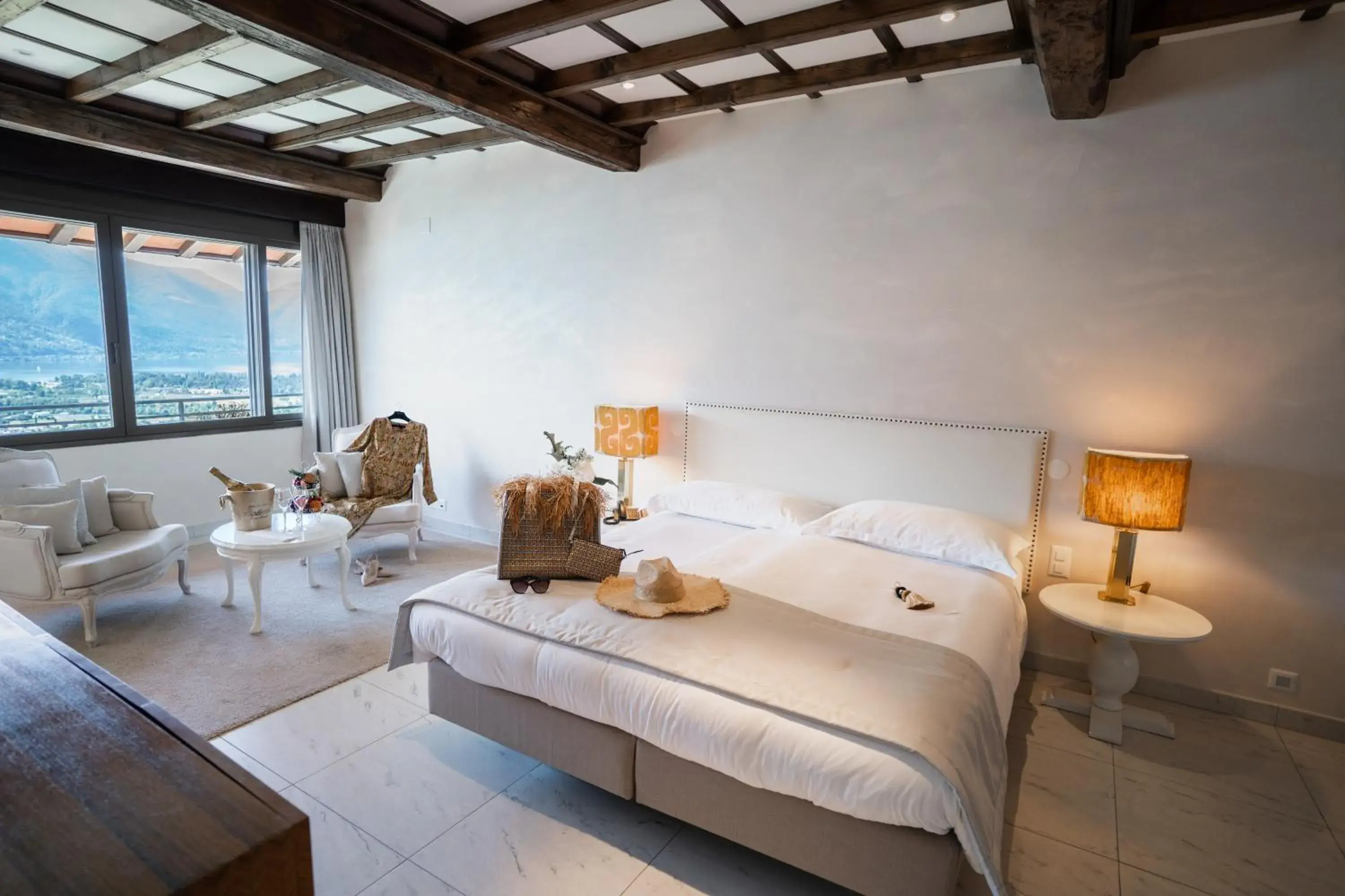 Bedroom, Bed in Villa Orselina - Small Luxury Hotel