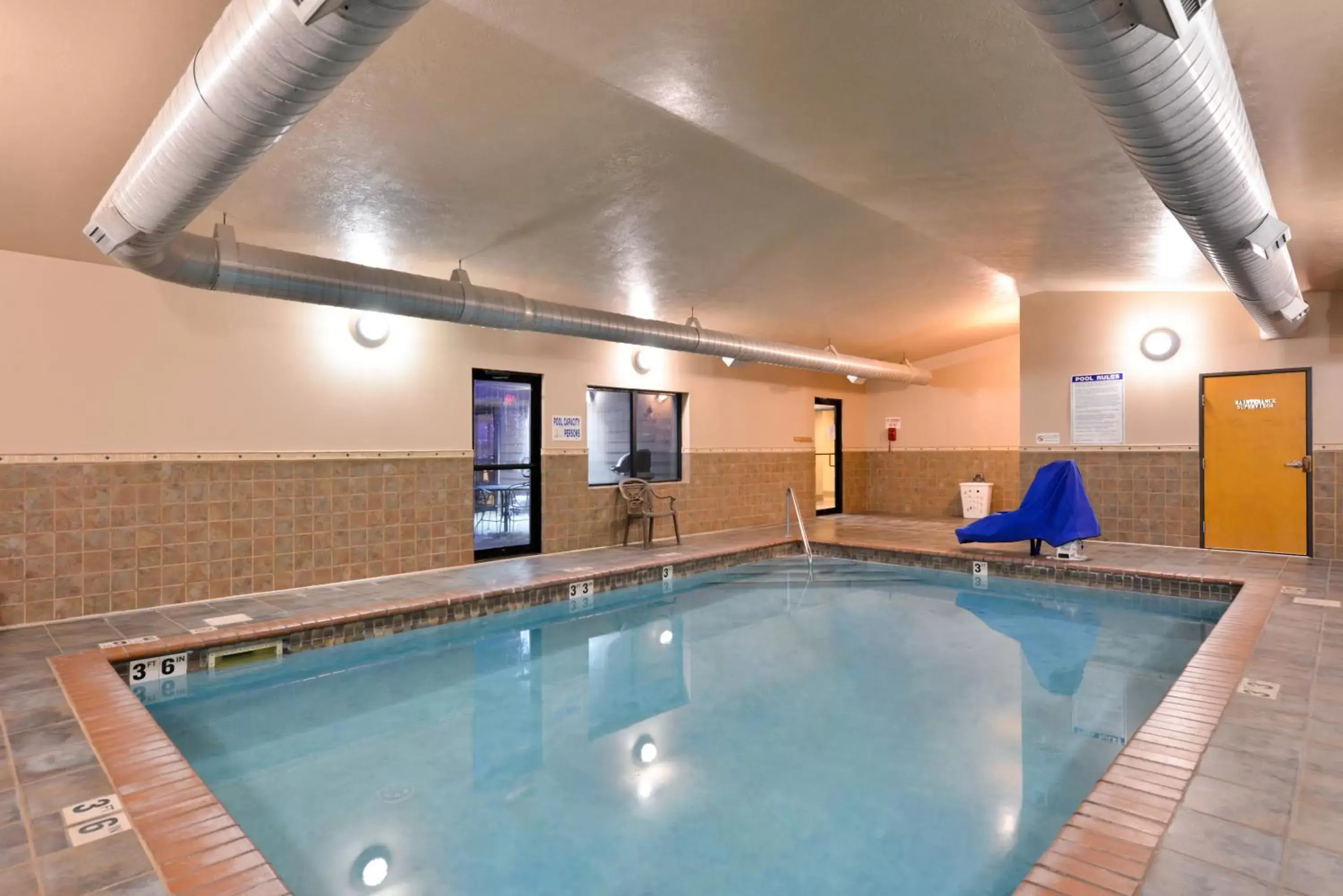 Swimming Pool in Baymont by Wyndham Sioux Falls North I-29 and Russell Street
