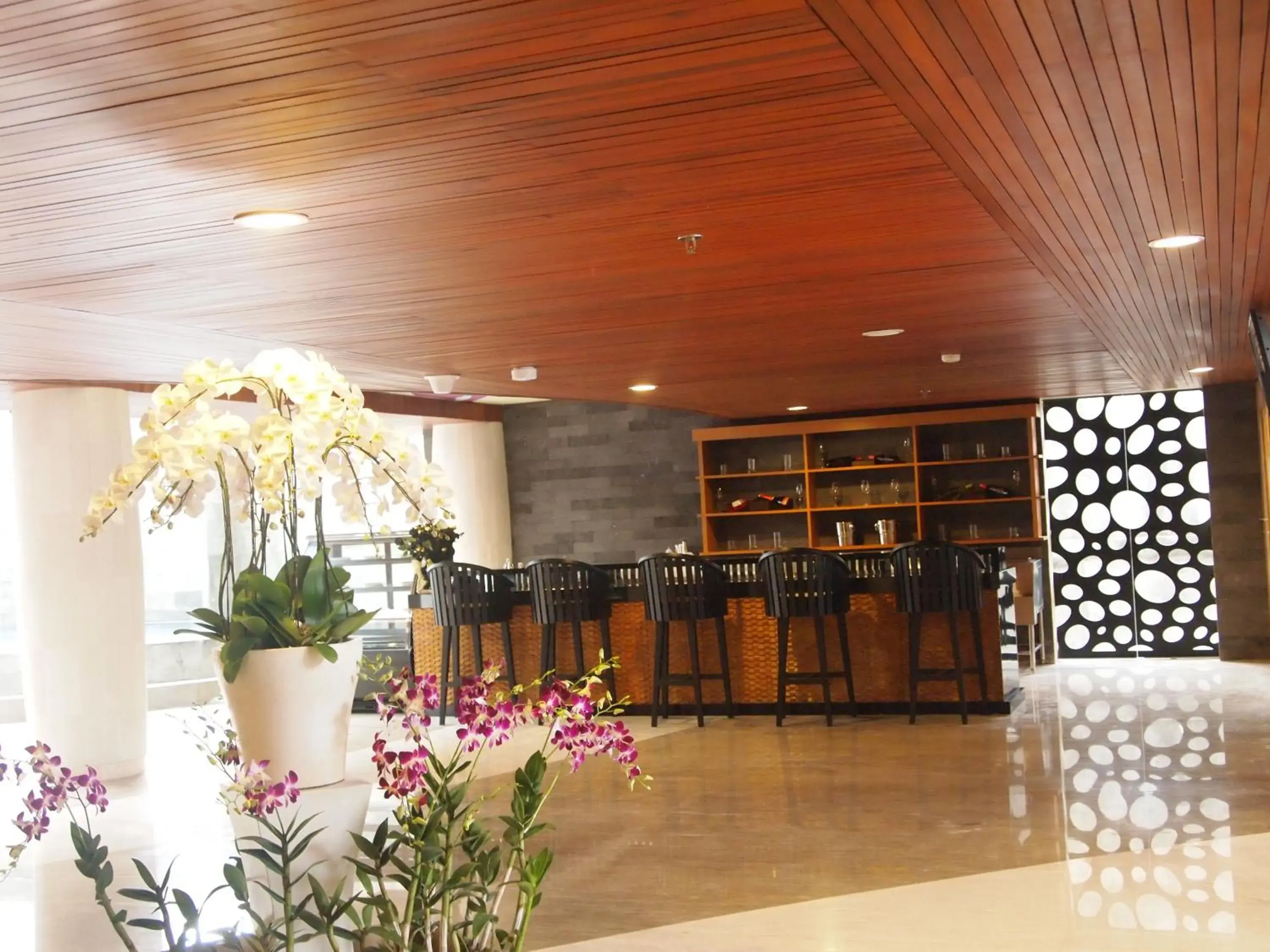 Communal lounge/ TV room in Bedrock Hotel Kuta Bali